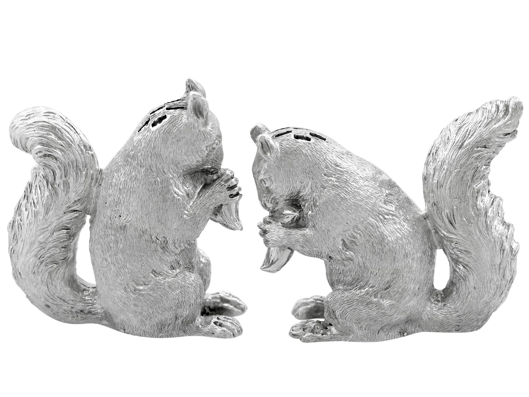 An exceptional, fine and impressive, rare pair of antique Victorian English cast sterling silver peppers in the form of squirrels; an addition to our silver cruets / condiments collection

These exceptional and rare antique Victorian English cast