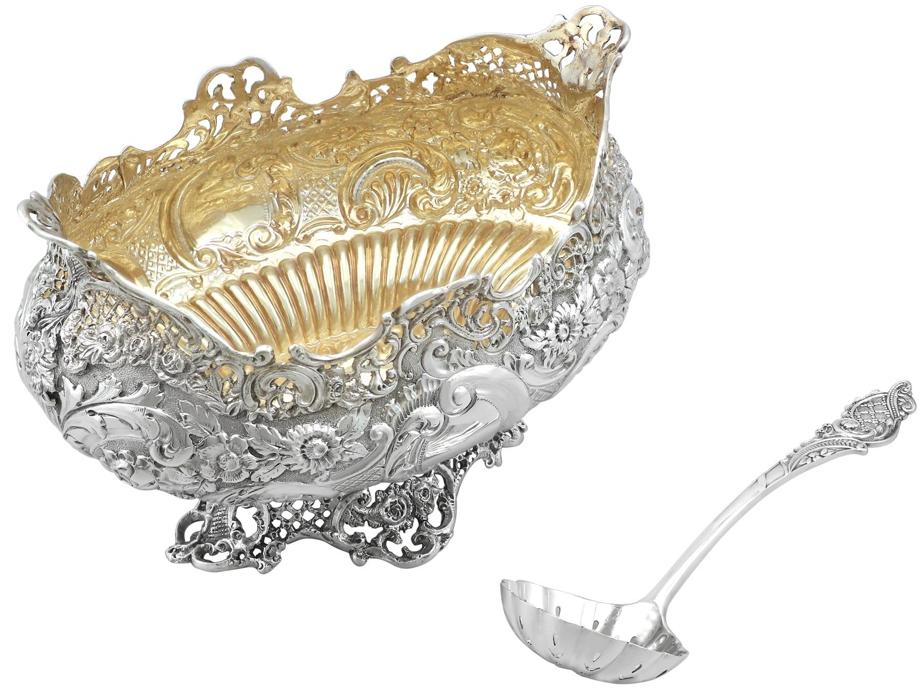 An exceptional, fine and impressive antique Victorian English sterling silver sugar sifter spoon and bowl - boxed; an addition to our silver teaware collection.

This exceptional antique Victorian sterling silver teaware set consists of a sugar bowl