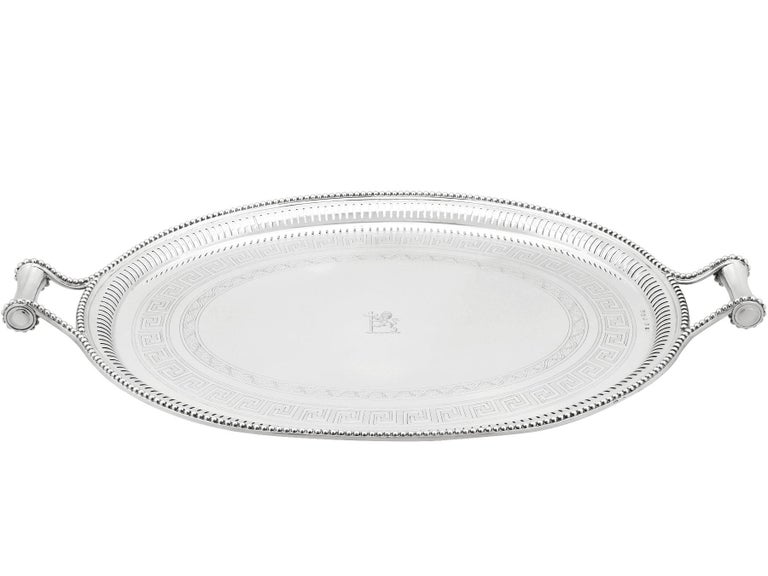 A magnificent, fine and impressive, antique Victorian English sterling silver oval tray, an addition to our Victorian teaware collection.

This magnificent antique Victorian silver tray, in sterling standard, has a plain oval form.

The large