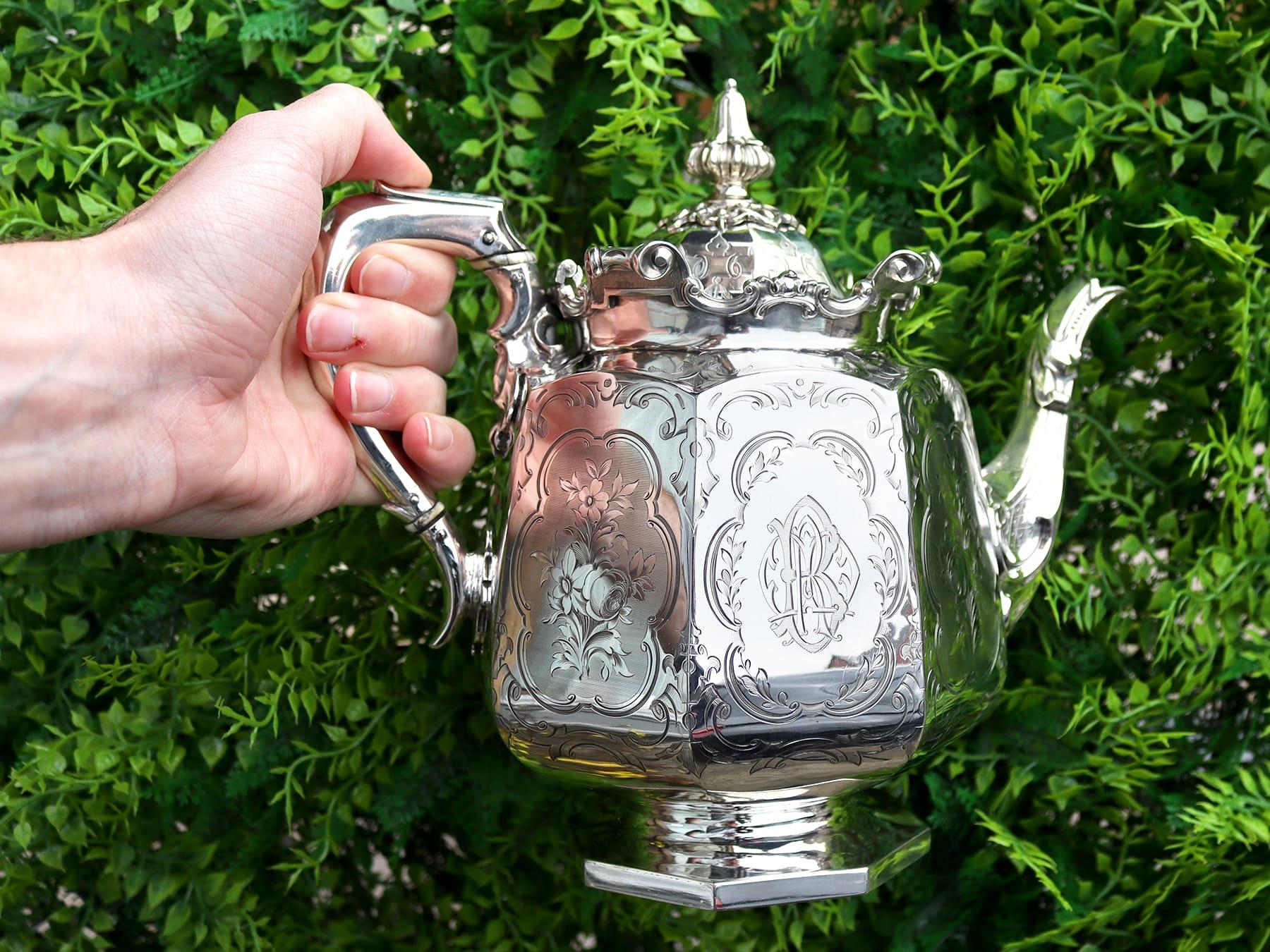 An exceptional, fine and impressive antique Victorian English sterling silver teapot; an addition to our silver teaware collection

This exceptional antique Victorian sterling silver teapot has an octagonal rounded form to an octagonal panelled