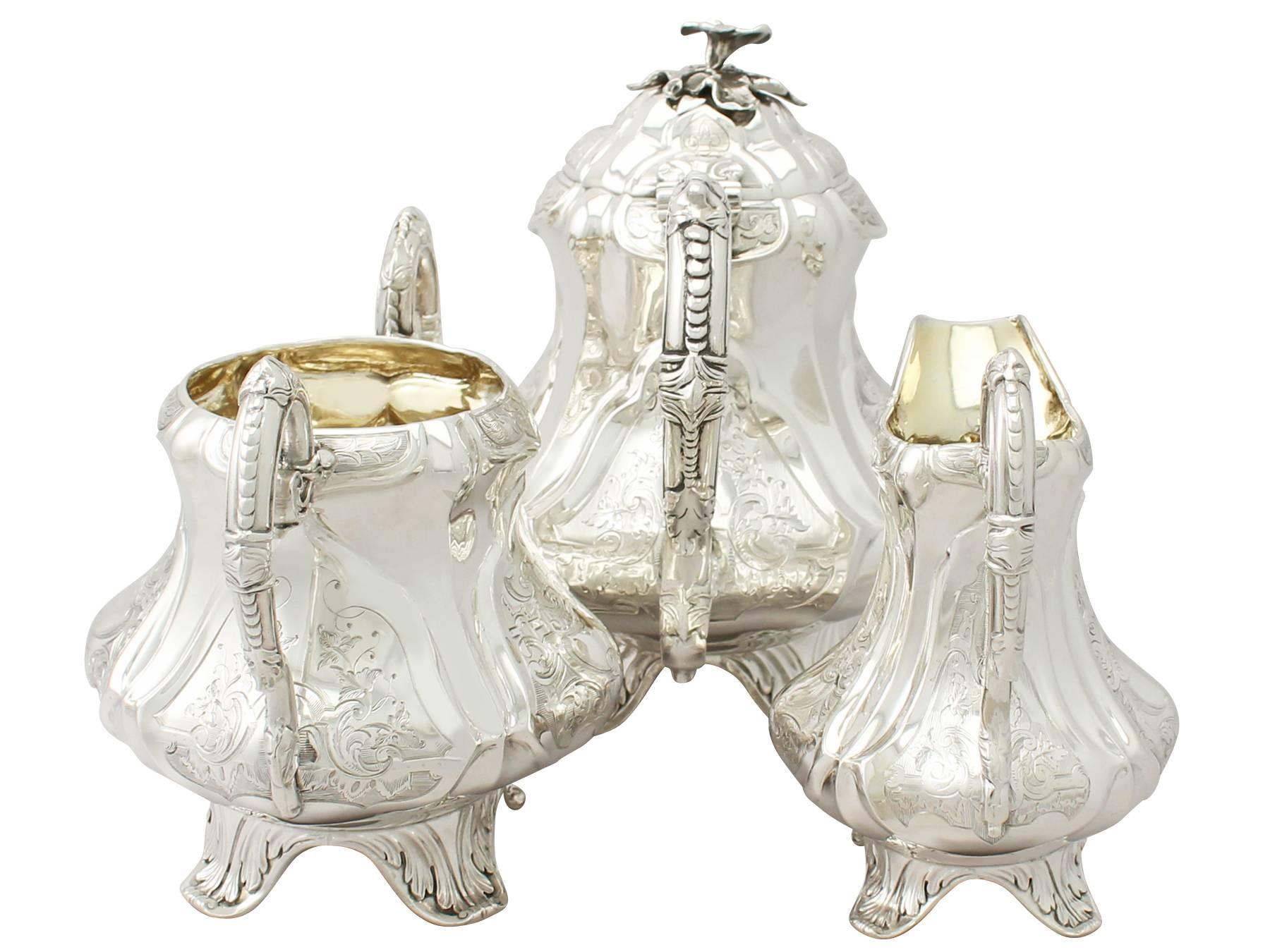 A fine, impressive and unusual antique Victorian English sterling silver three-piece tea service by Joseph Angell II; part of our silver teaware collection

The pieces of this unusual antique Victorian sterling silver three-piece tea service have