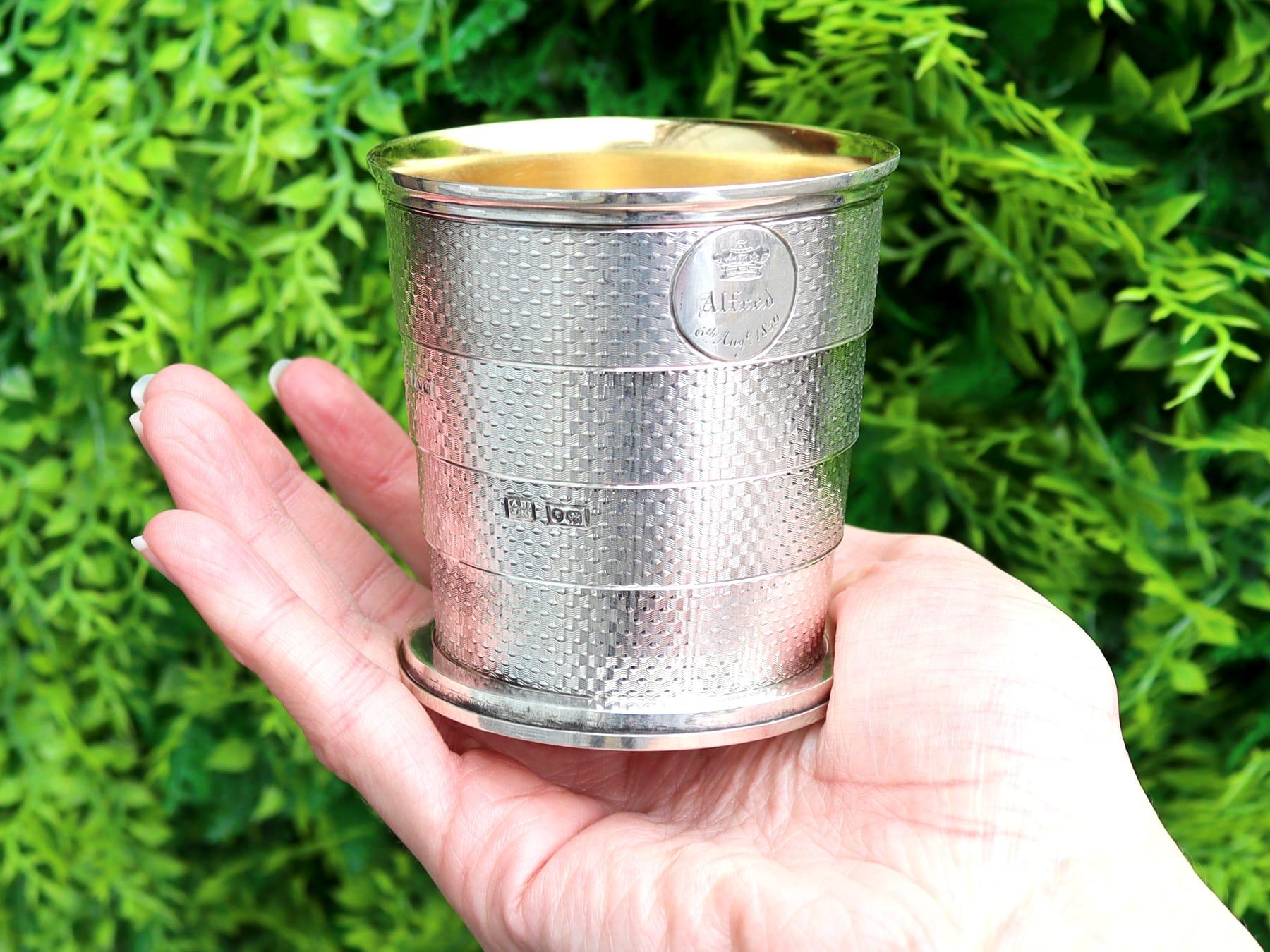 A fine and impressive antique Victorian English sterling silver collapsible beaker with royal interest - boxed; an addition to our Victorian silverware collection.

This impressive antique Victorian sterling silver collapsible beaker has a circular