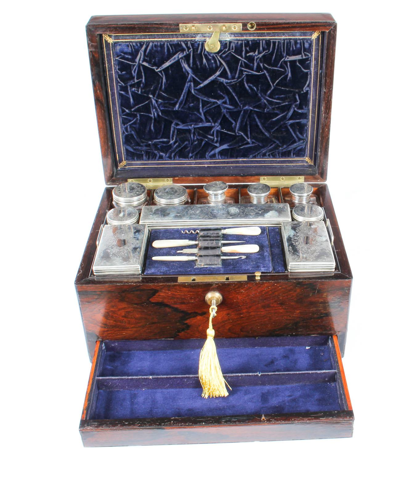 This is a very attractive antique Victorian gonzalo alves travelling dressing case retailed by Mechi of London and dated 1861.
 
This stunning case is hinged and of rectangular form. It features a vacant oval cartouche to the lid and encloses a