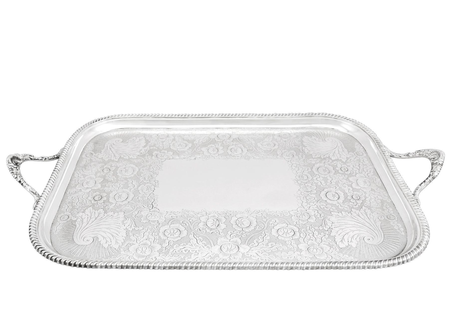 A magnificent, Fine and impressive, large antique Victorian English sterling silver two handled tray by Thomas Bradbury & Sons; an addition to our silver tray collection.

This magnificent, Fine and impressive antique Victorian sterling silver
