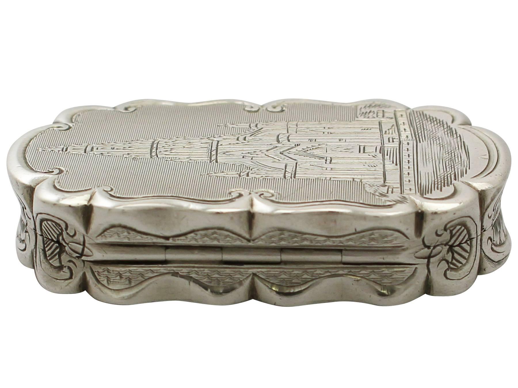 An exceptional, fine and impressive antique Victorian English sterling silver vinaigrette depicting Scott Monument; an addition to our boxes collection.

This exceptional antique Victorian sterling silver vinaigrette has a rectangular incurved