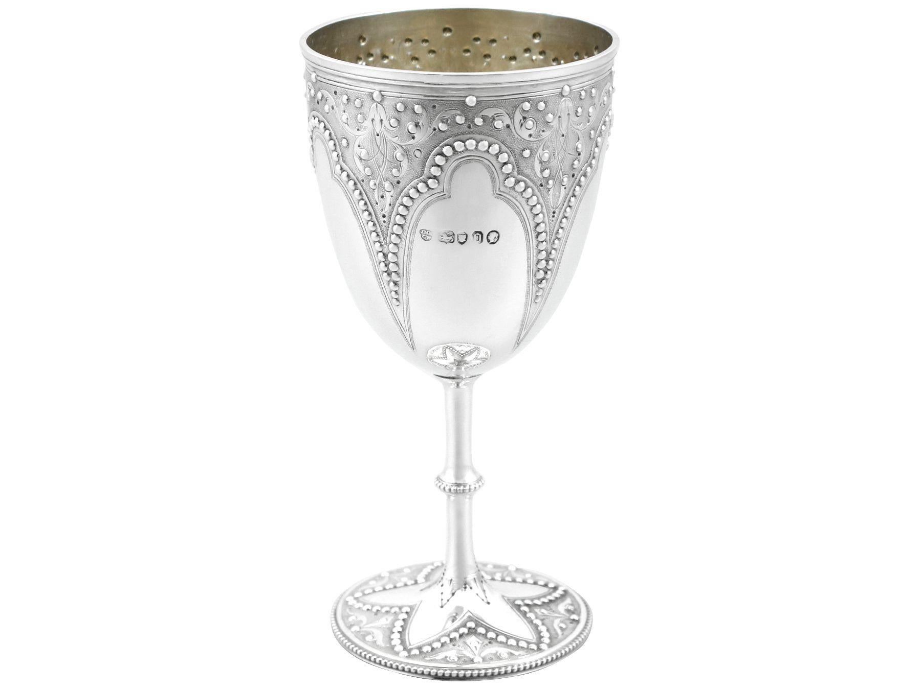 An exceptional, fine and impressive antique Victorian English sterling silver wine goblet; an addition to our antique wine and drinks related silverware collection

This exceptional antique Victorian sterling silver wine goblet has a circular bell