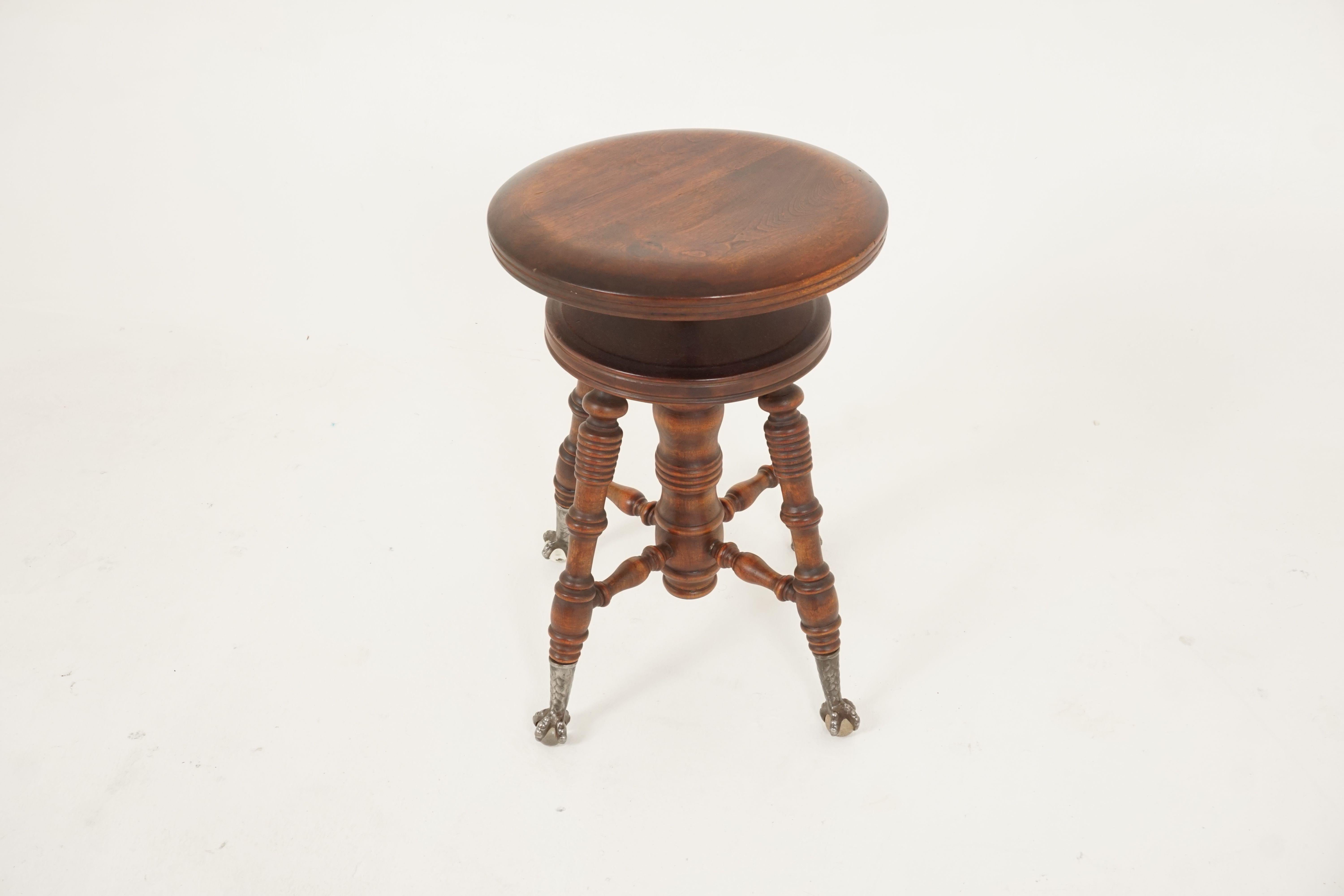 Antique Victorian stool, beechwood, revolving piano stool, American 1900, B2514

American 1900
Solid beechwood
Original finish
Round shaped seat with working rise and fall action
Fine turned legs finished in a gilt metal claw with original