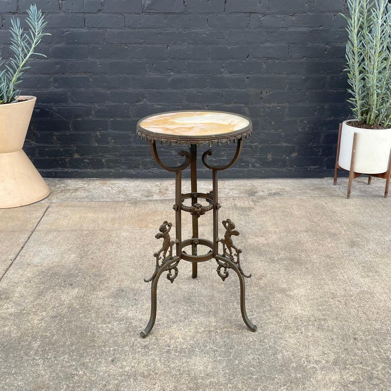 Antique Victorian Style End Table with Angel Motifs and Stone Top For