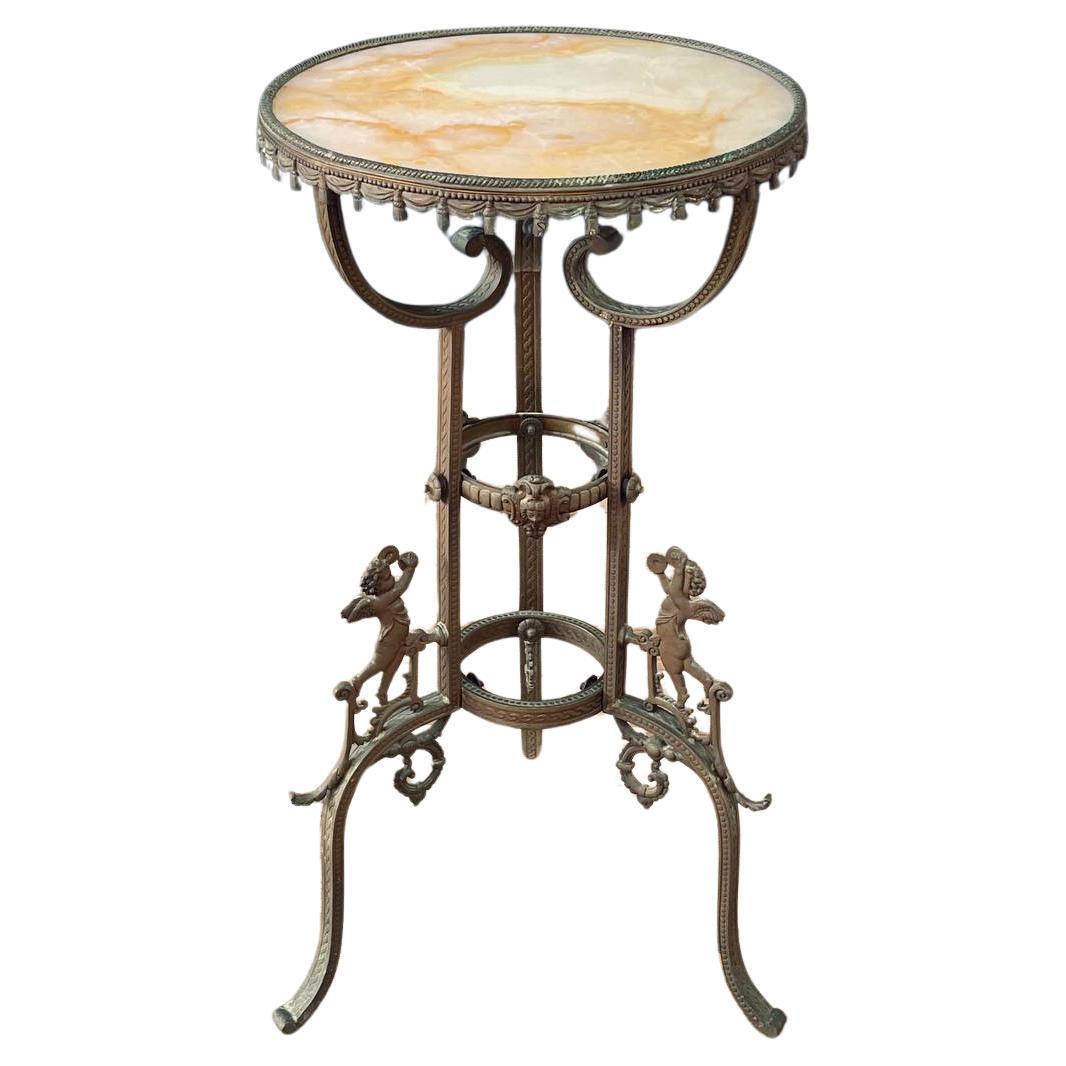 Table d'appoint victorienne ancienne avec motifs d'anges et plateau en pierre