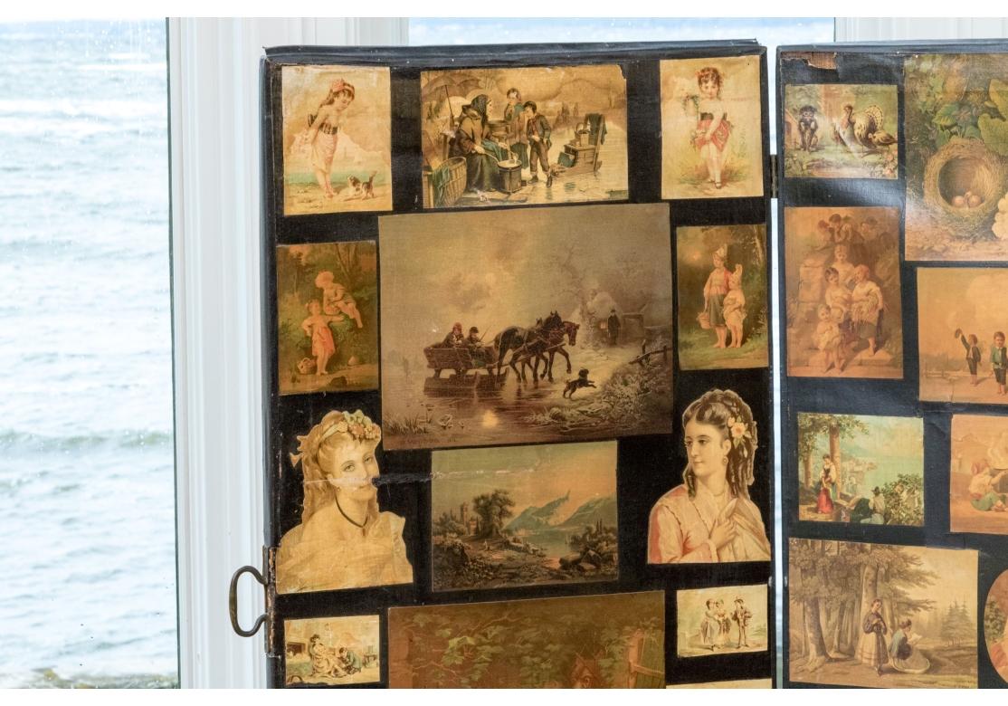 A colorful and very decorative four-panel Screen/ Divider with dozens of affixed images depicting all sorts of Victorian scenes. Images include portraits, animals, children, butterflies, flowers and Native Americans. The images on the facing side