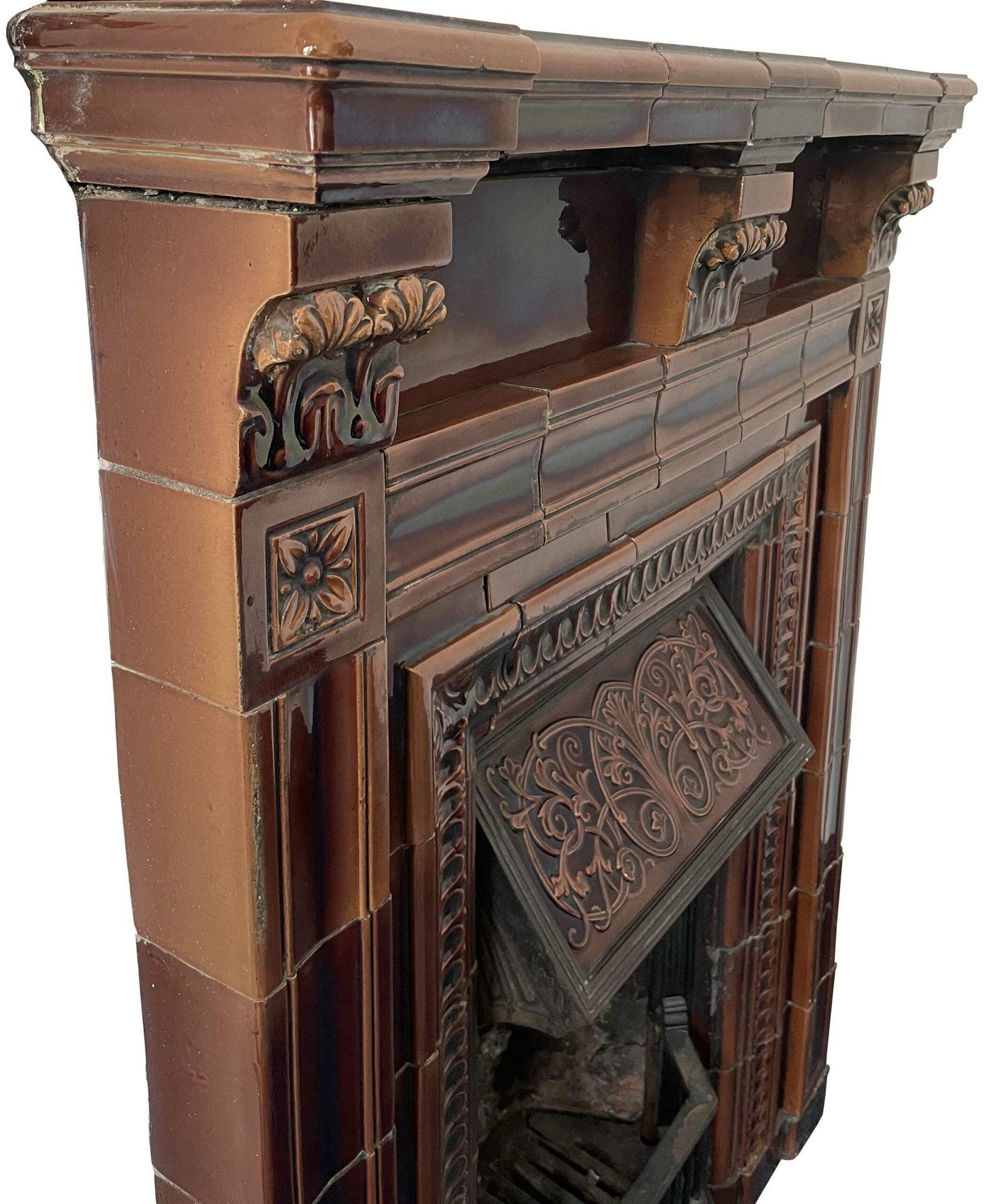 This is one of three similar fire mantels recently salvaged from a property in the East of England. It is most likely made by Doulton. It features a two-tone brown glaze.
 
Additional Dimensions 
Opening Height 83.5 cm
Opening Width 46