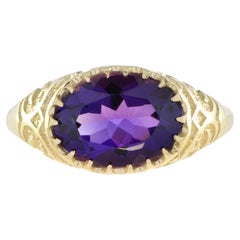 Anello antico in stile vittoriano con grande ametista incisa in oro giallo 9k