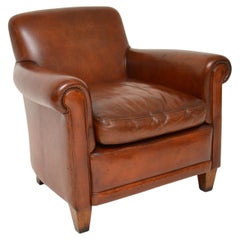 Sillón antiguo de cuero de estilo victoriano
