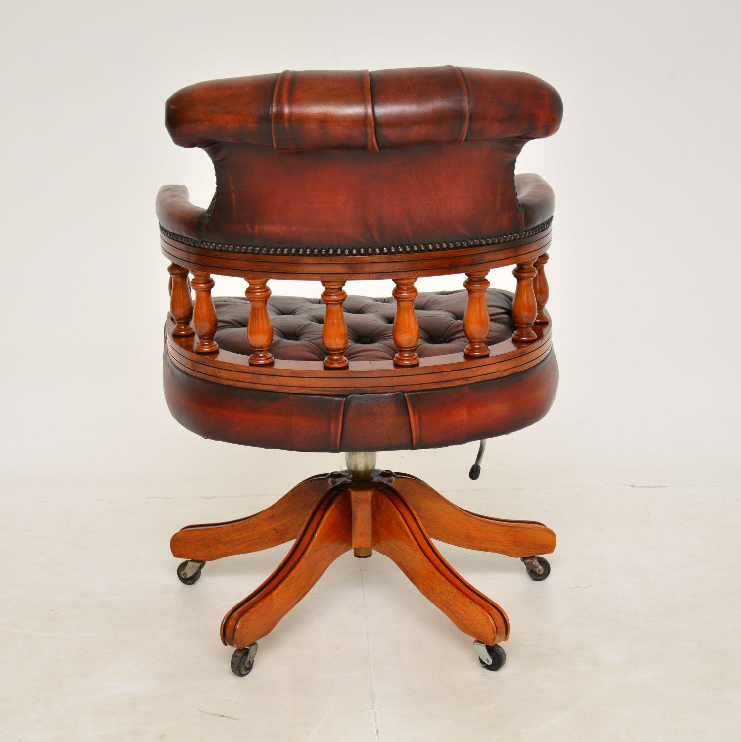 Antique leather captains chair sale