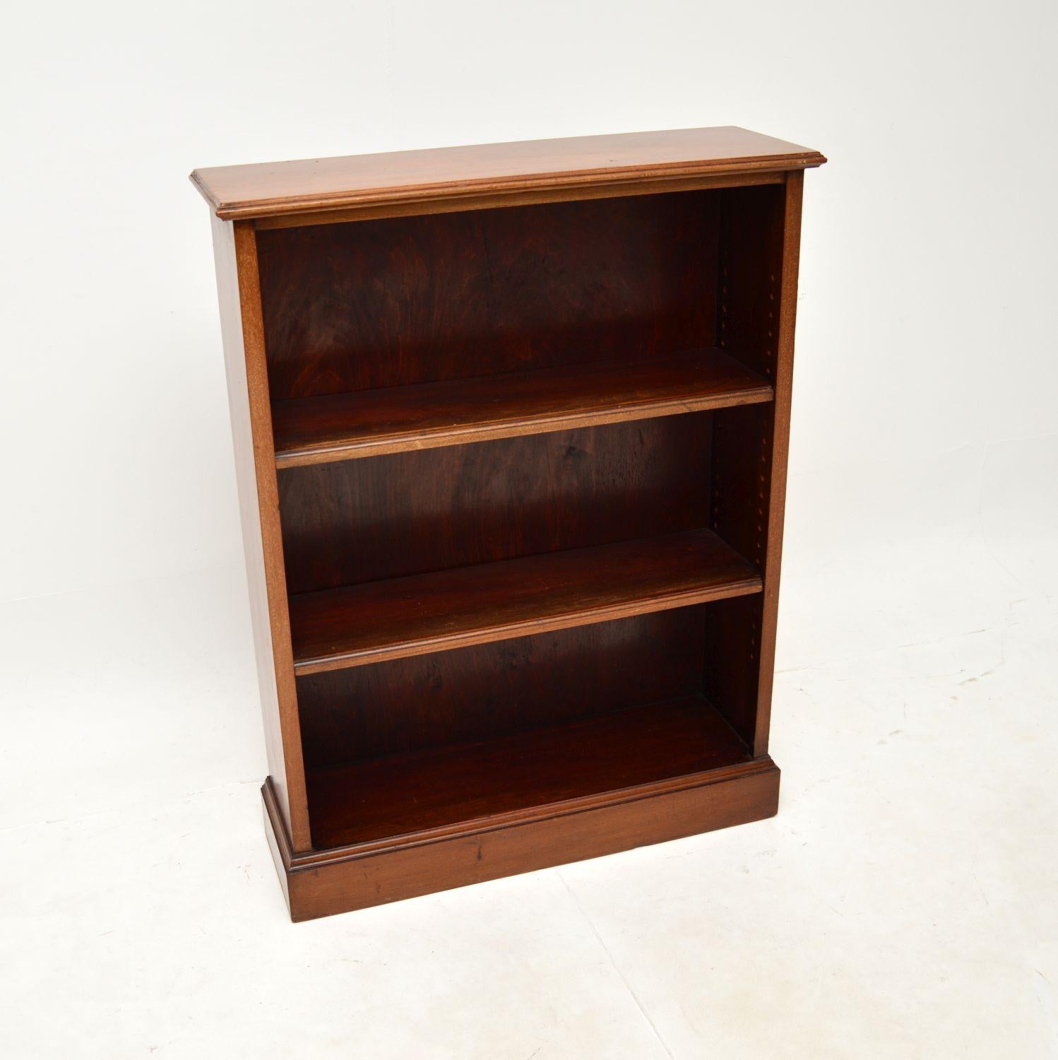 A smart and very well made antique open bookcase. This was made in England, it dates from around the 1920’s.

This is of superb quality and is a very useful size. It is fairly small and compact, yet offers plenty of storage space for books. The two