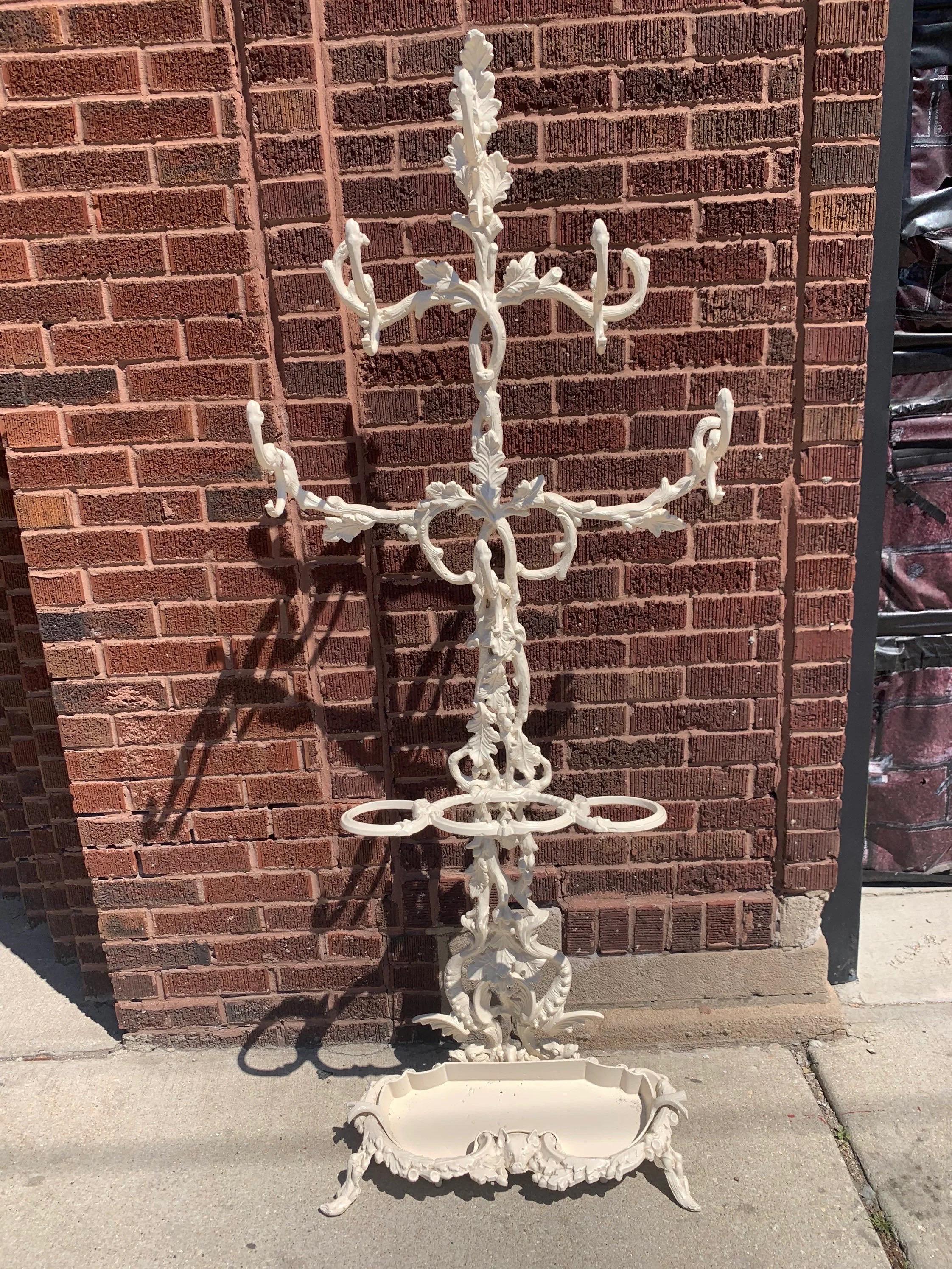 Antique Victorian Style Ornate White Painted Coat Rack

There are 3 umbrella compartments, and 6 hooks. Each hook is a fashioned from a bird, and the tree is made of oak leaves and acorns. 

Circa 1930

Dimensions:

H 67”
W 27”
D 10”