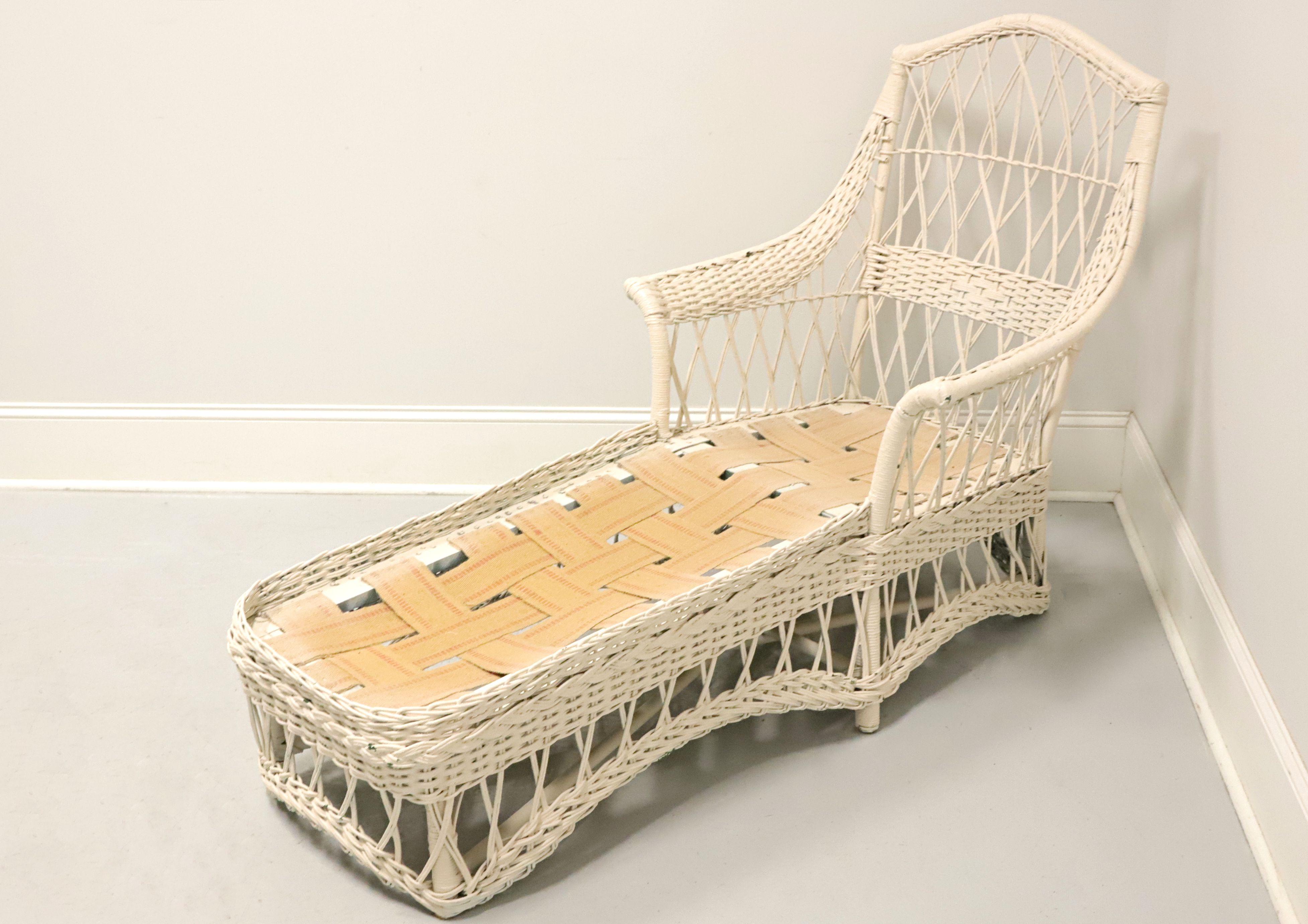 white wicker chaise lounge