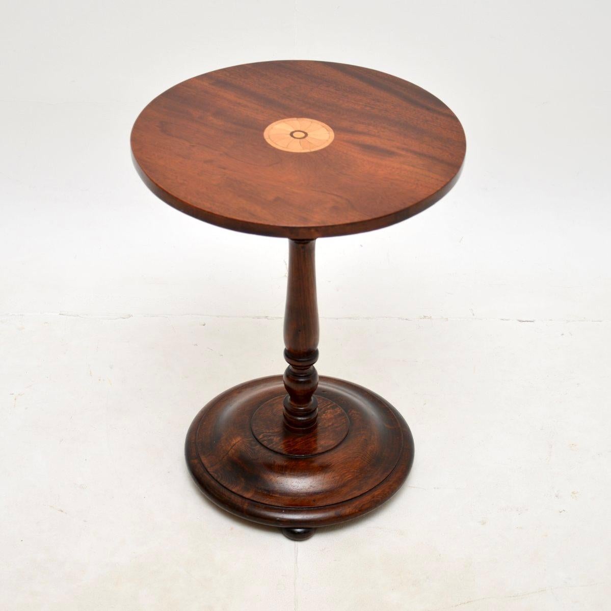 A lovely antique Victorian Style wine table, made in England and dating from around the 1920’s.

This is of superb quality, with beautiful satinwood inlay in the circular top, the base is beautifully turned from solid oak.

We have had this recently