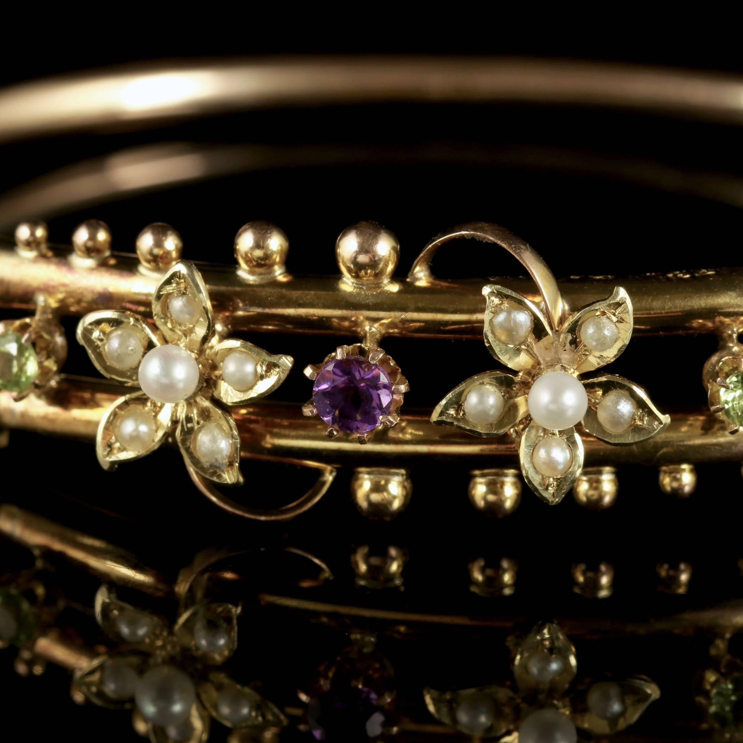 To read more please click continue reading below-

This stunning antique Victorian 9ct Yellow Gold floral bangle was made representing the Suffragette movement, Circa 1900. 

Suffragettes liked to be depicted as feminine, their jewellery popularly