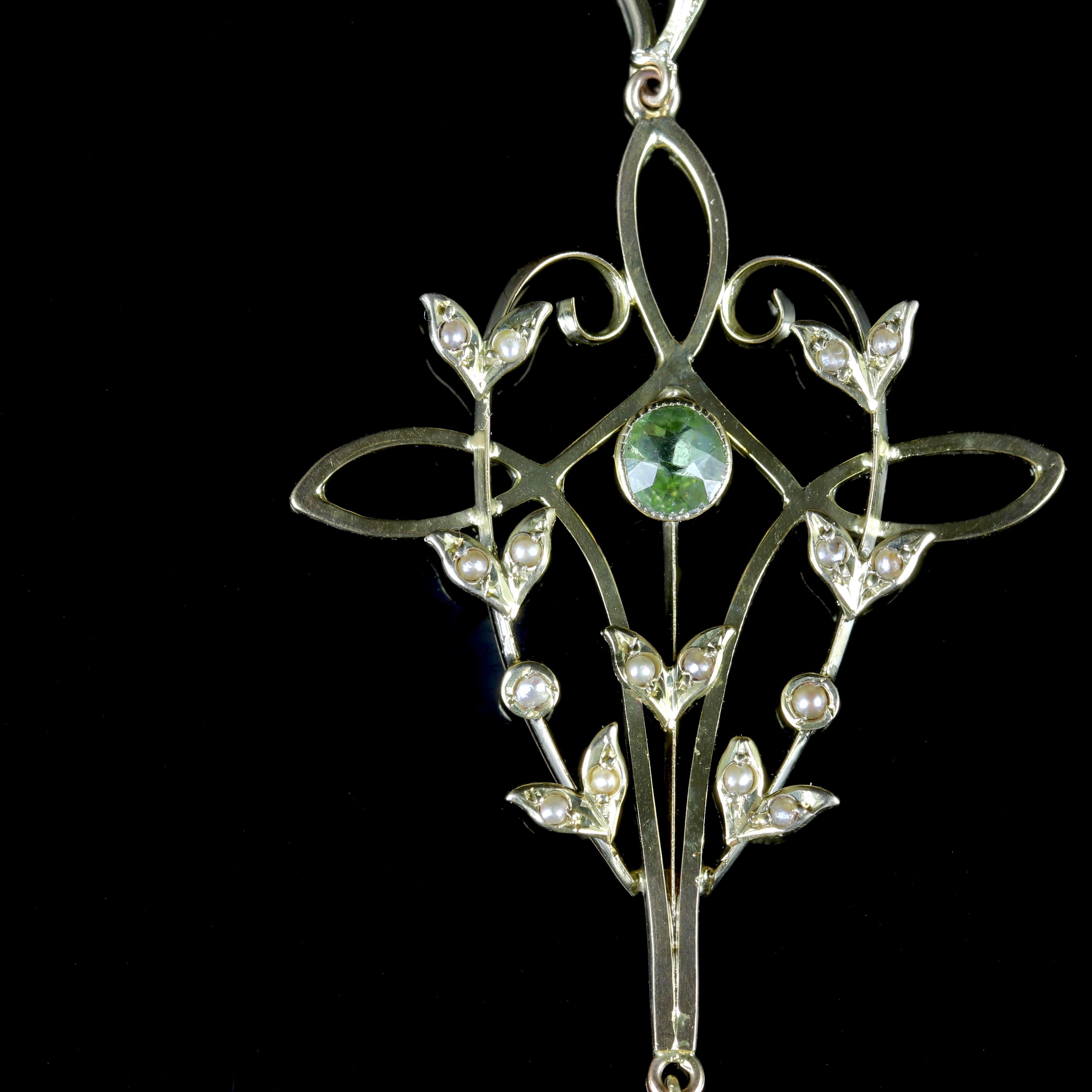 This fabulous 9ct Victorian Suffragette Pendant is Circa 1900.

The beautiful pendant is set with lustrous Pearls, a pretty 0.25ct Peridot and a 0.20ct deep purple Amethyst dropper. 

The combination of gemstones represent such a powerful