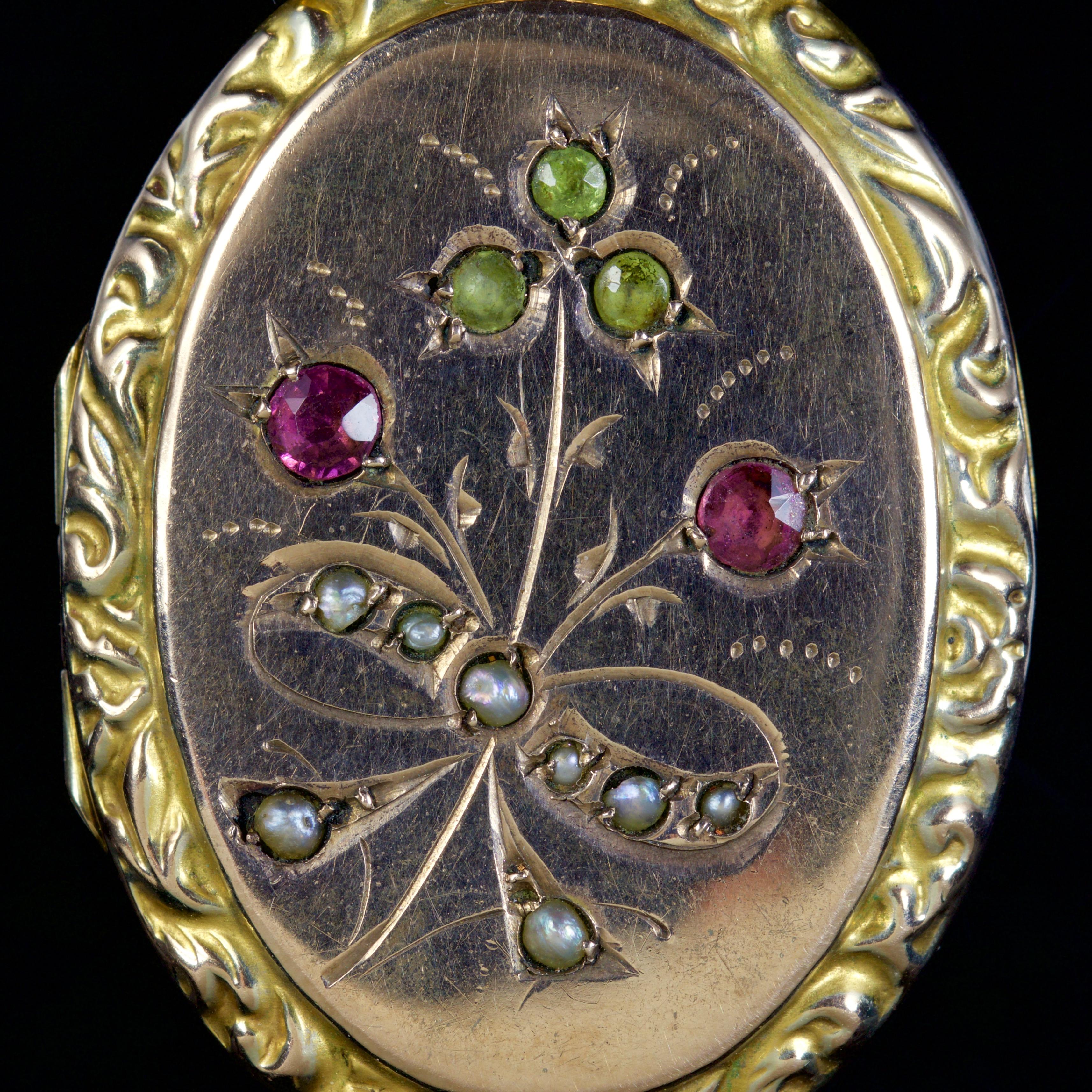 This beautiful Victorian Suffragette locket is set in 9ct Gold, Circa 1900.

The locket shows beautiful details, boasting Peridots, Amethyst and Pearls which represent the Suffragette movement.

The Peridot is a stone of lightness and beauty and was