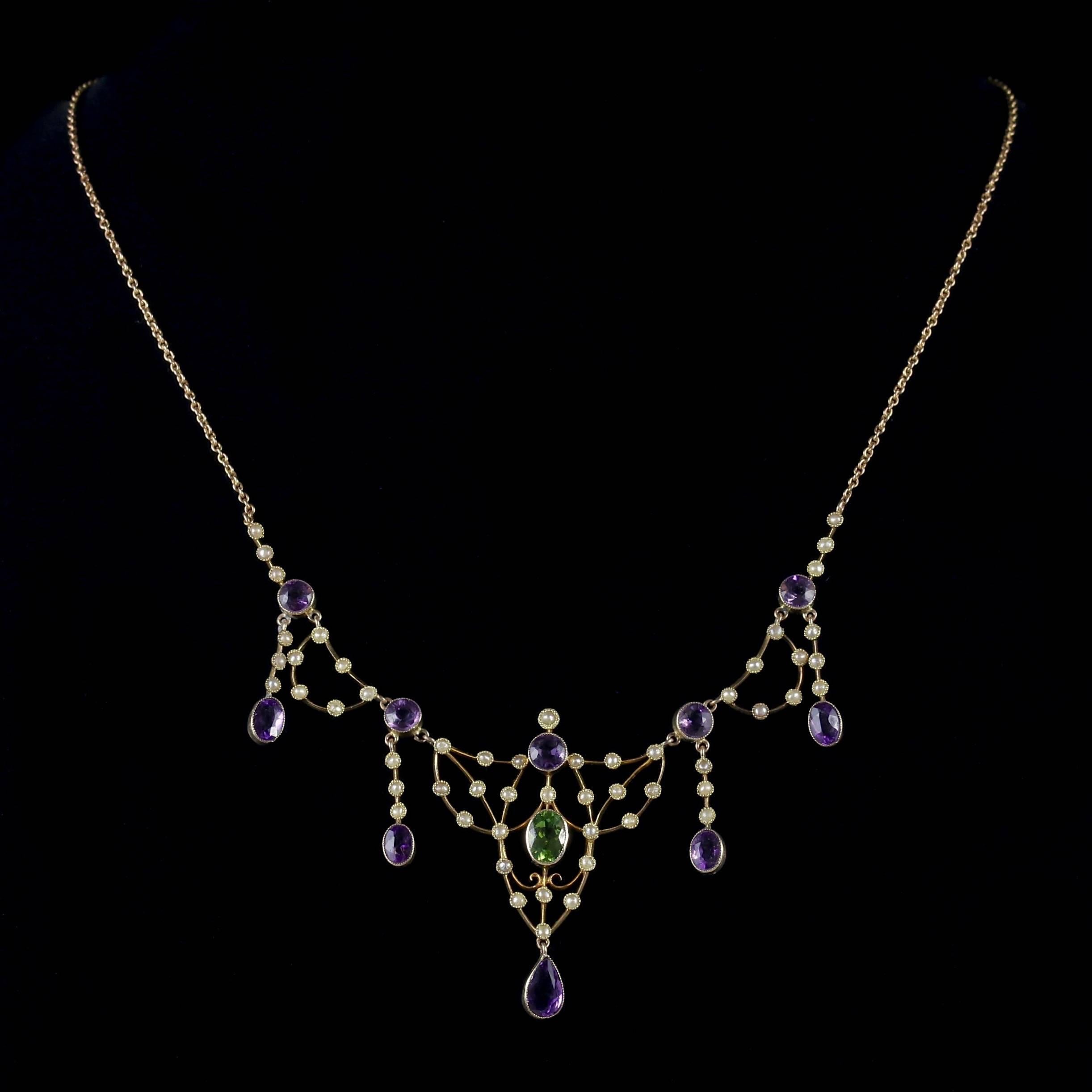 To read more please click continue reading below-

This magnificent antique Victorian lavaliere necklace was made representing the Suffragette movement, Circa 1900. 

Suffragettes liked to be depicted as feminine, their jewellery popularly consisted