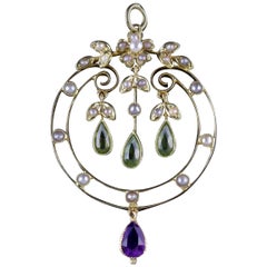 Antique Victorian Suffragette Pendant 15 Carat Gold Peridot Droppers, circa 1900