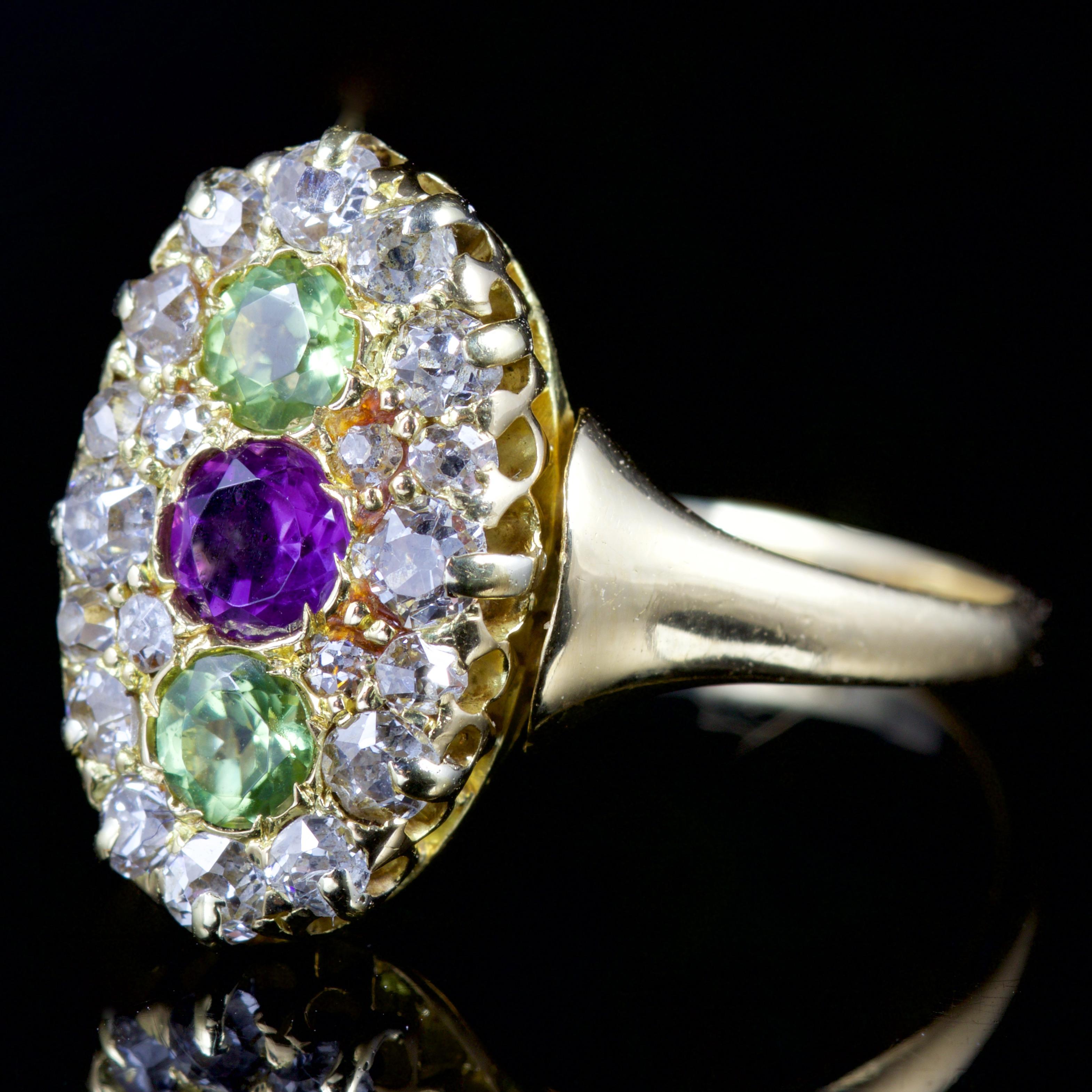 This dazzling antique Victorian Suffragette 18ct Yellow Gold ring is, Circa 1900.

The fantastic ring boasts a beautiful combination of gemstones which are Amethyst, Peridot and Diamonds, they represent such a powerful time.

The centre Amethyst is