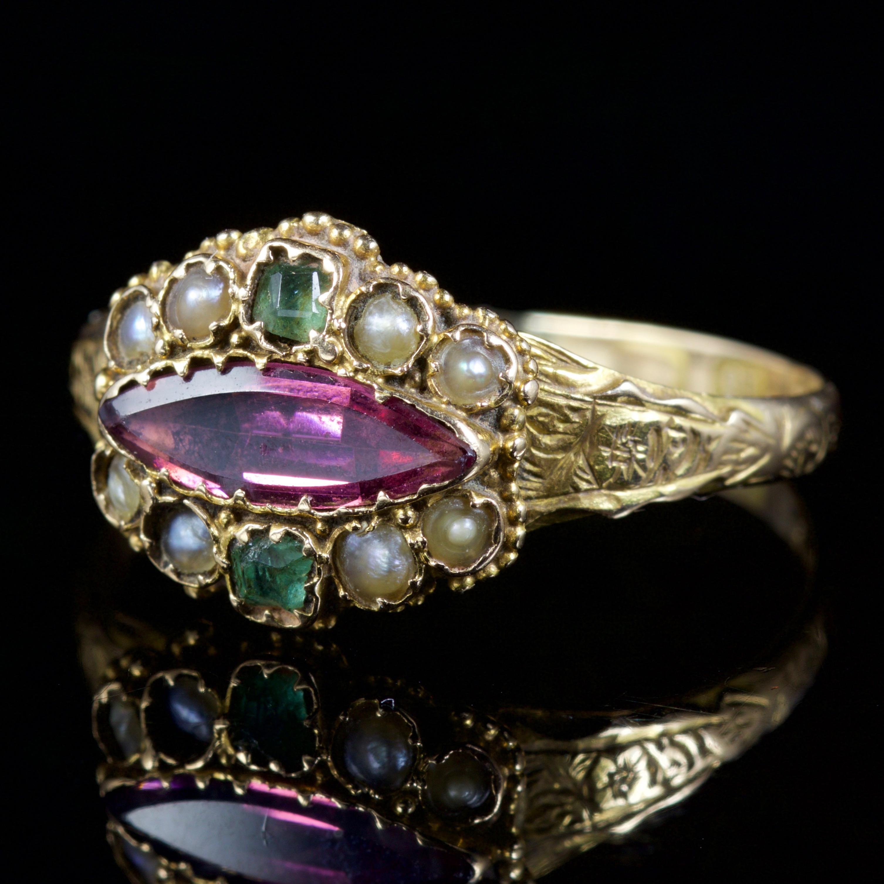 This adorable Victorian ring is set in 15ct Gold, Circa 1900.

The pink Tourmaline is set across the centre, this beautiful stone is 0.75ct.

The Tourmaline is surrounded by a halo of Pearls and Emeralds.

The combination of gemstones represent the