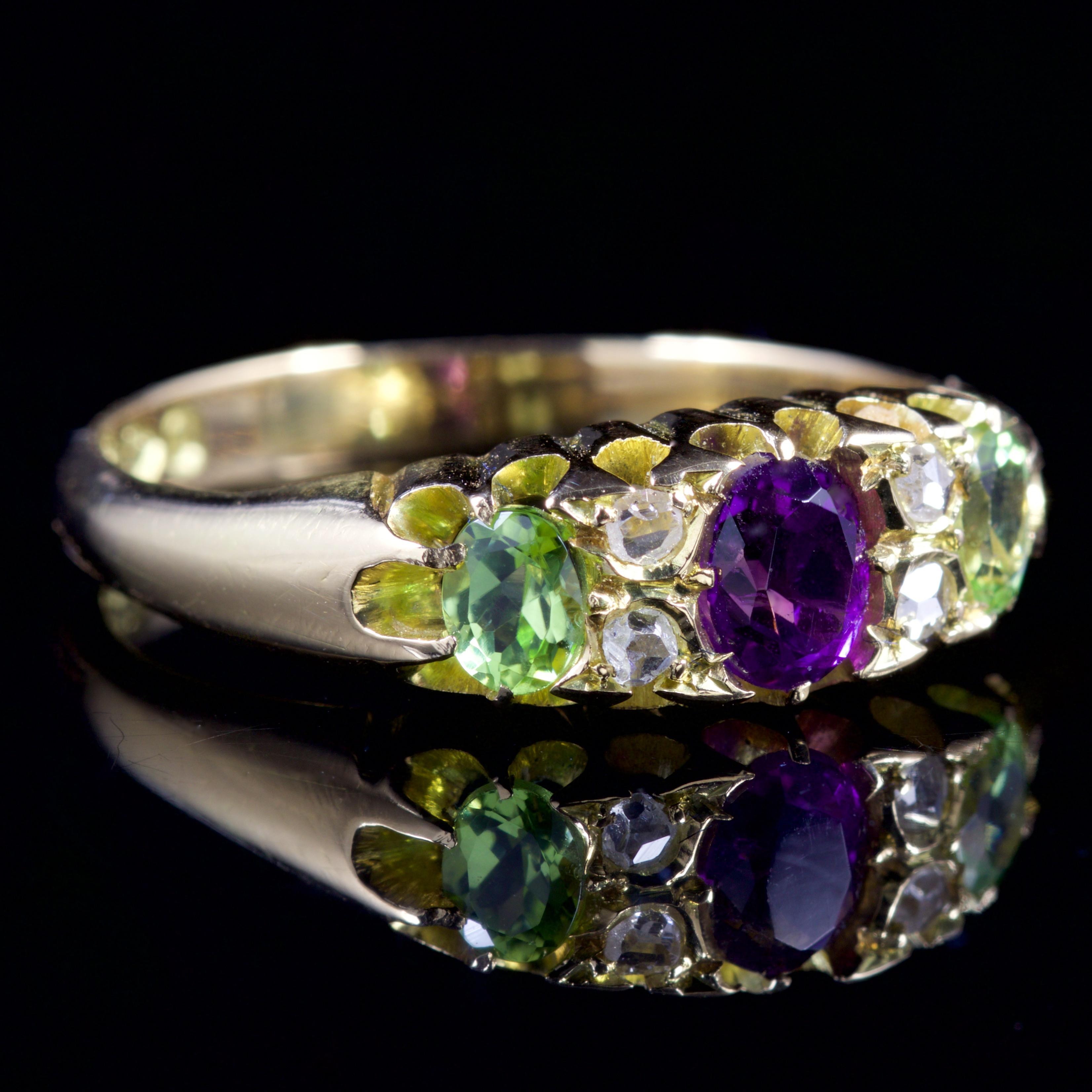 This beautiful Victorian 18ct Gold Suffragette ring is dated Chester 1897.

The wonderful ring is decorated with a deep, purple 0.25ct Amethyst, with two rich green Peridots and lovely sparkling old cut Diamonds nestled in-between.

Suffragettes