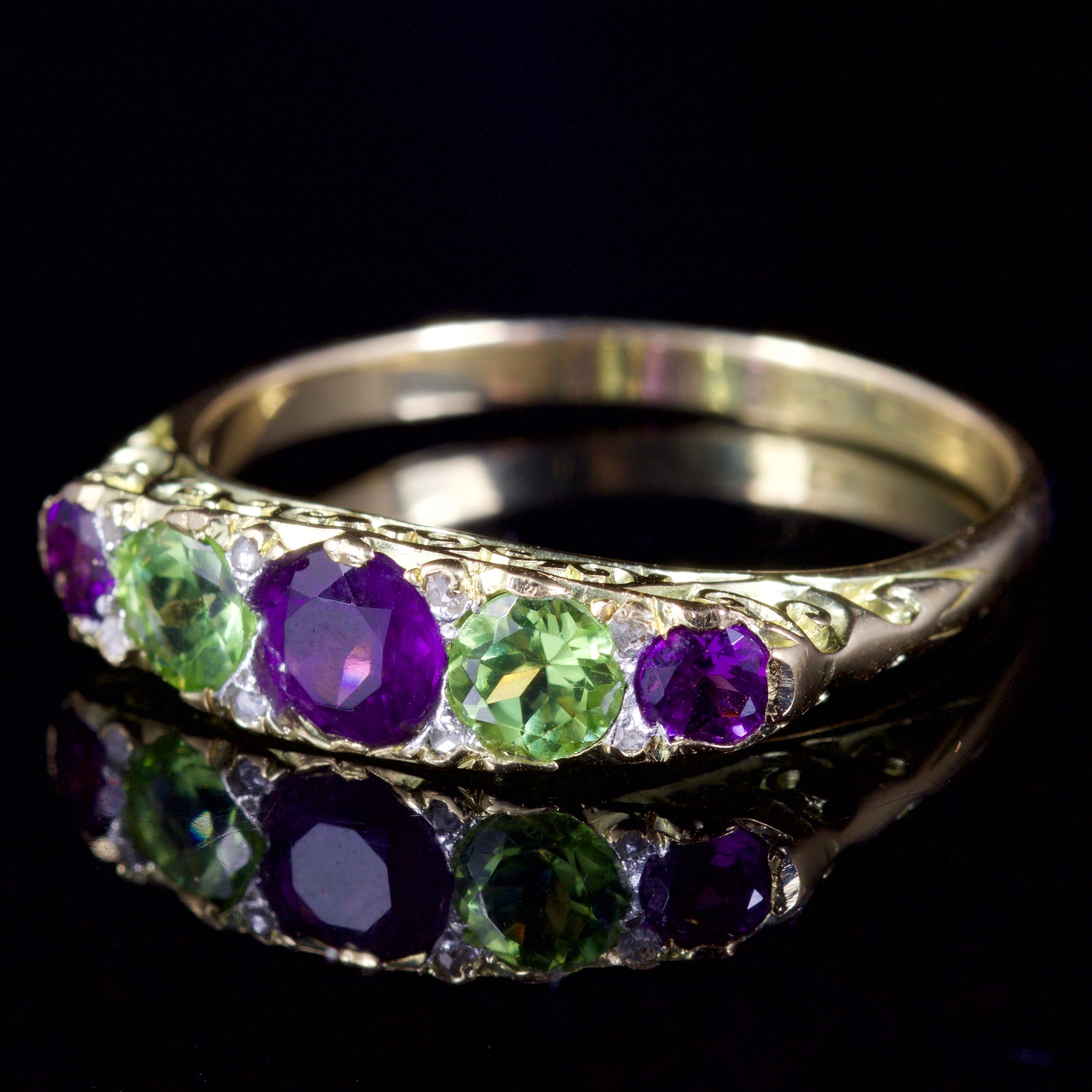 This fabulous Victorian Suffragette ring is set in 18ct Gold, Circa 1900.

The ring boasts a beautiful combinations of Amethysts, Peridots and Diamonds.

The centre Amethyst is 0.25ct and the two outer Peridots are both 0.20ct.

The wonderful