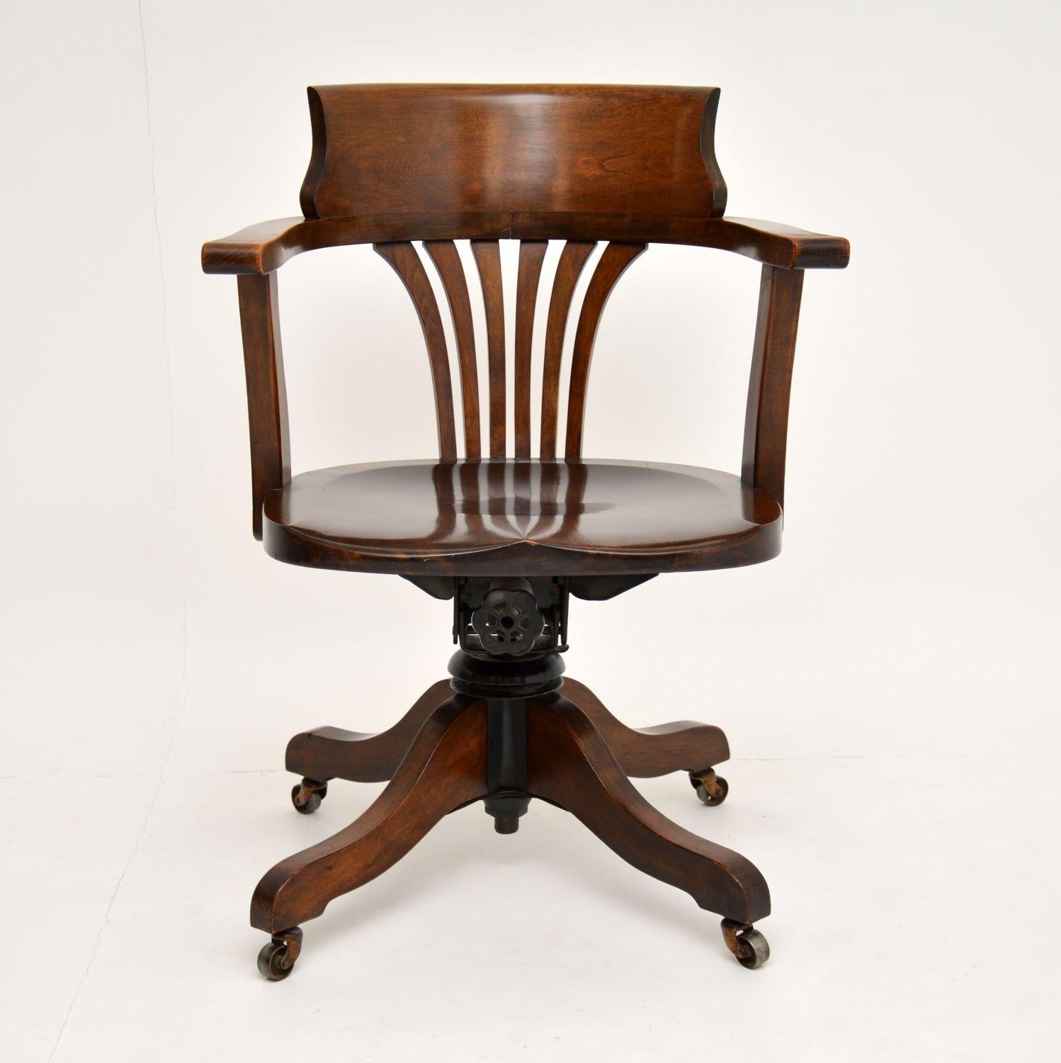 A smart and extremely well made antique swivel desk chair, dating from circa 1890-1900 period.

This is made from solid beech and is in superb original condition with a lovely patina. There is just some very minor surface wear here and there,