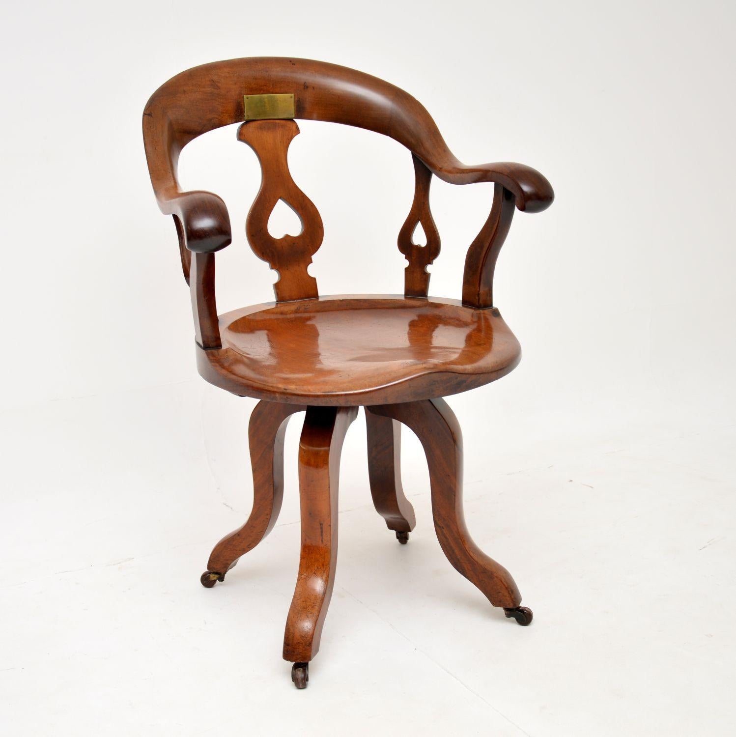 A superb original antique Victorian period swivel desk chair. This has a strong arts and crafts influence, it dates from the 1880’s.

In fact, this very interesting piece has an original brass plaque on the back rest, from when it was presented as