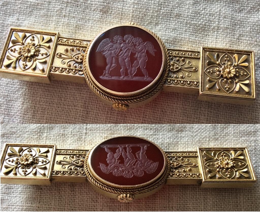 This is a rarest and Museum Quality cameo brooch carved on hard stone, Cornelian quality, depicting the Three Genii of Music Singing. The subject is after a sculpture by Bertel Thorvaldsen now in the Museum of Stockholm, see pictures below. The