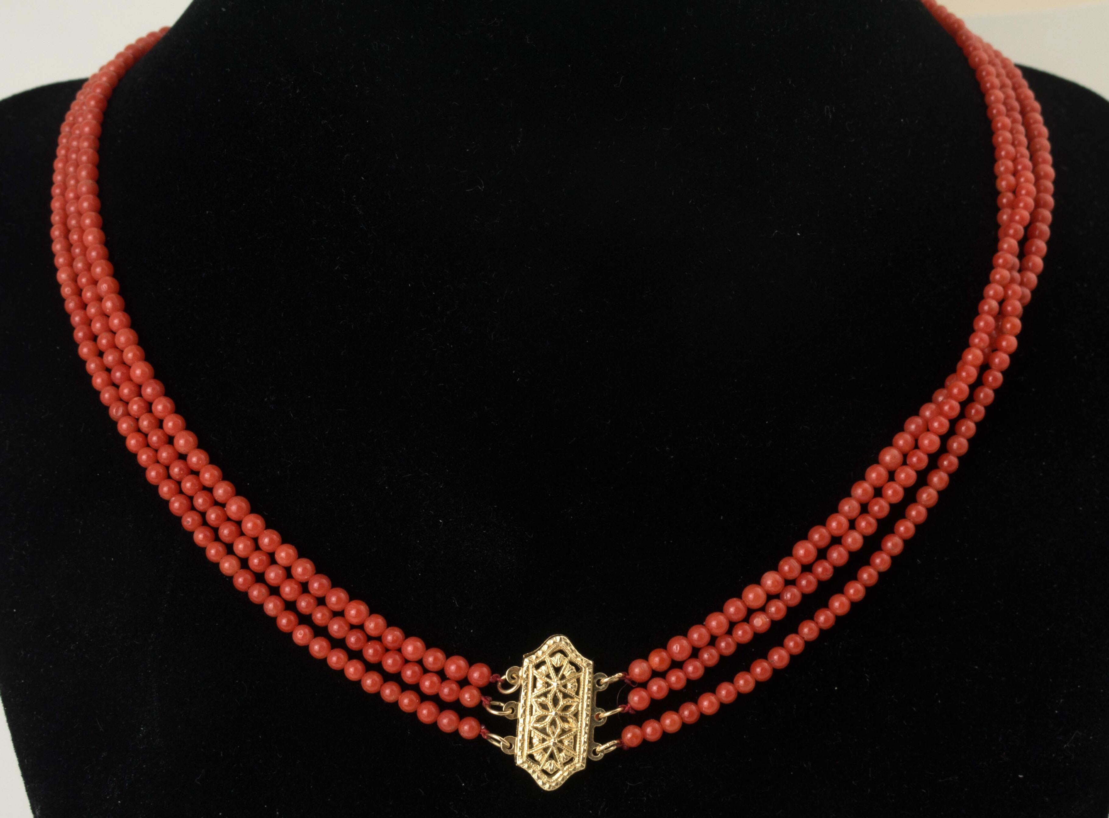 Three strands of fine beautiful round natural orange red color bead necklace with beautiful gold clasp. Beads measured approximately 3.5 mm to 4 mm. Each strand of coral beads are perfectly matched in color.
Total length including clasp is 16.5