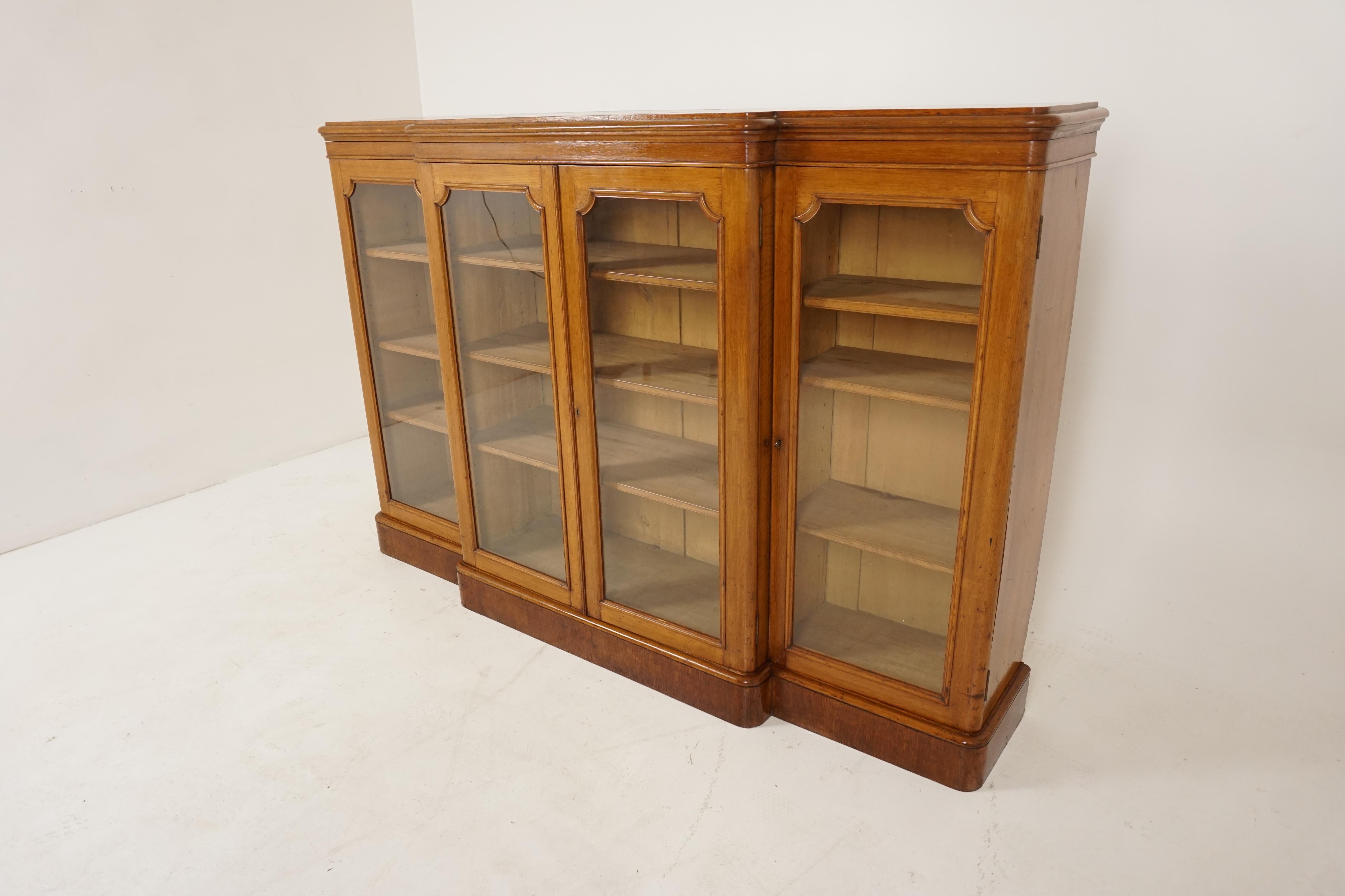 Antique Victorian tiger oak breakfront bookcase display cabinet, Scotland 1880, B2551

Scotland 1880
Solid tiger oak
Original finish
Moulded breakfront top
Double glass doors underneath
Opens to reveal three adjustable shelves
Flanked by a