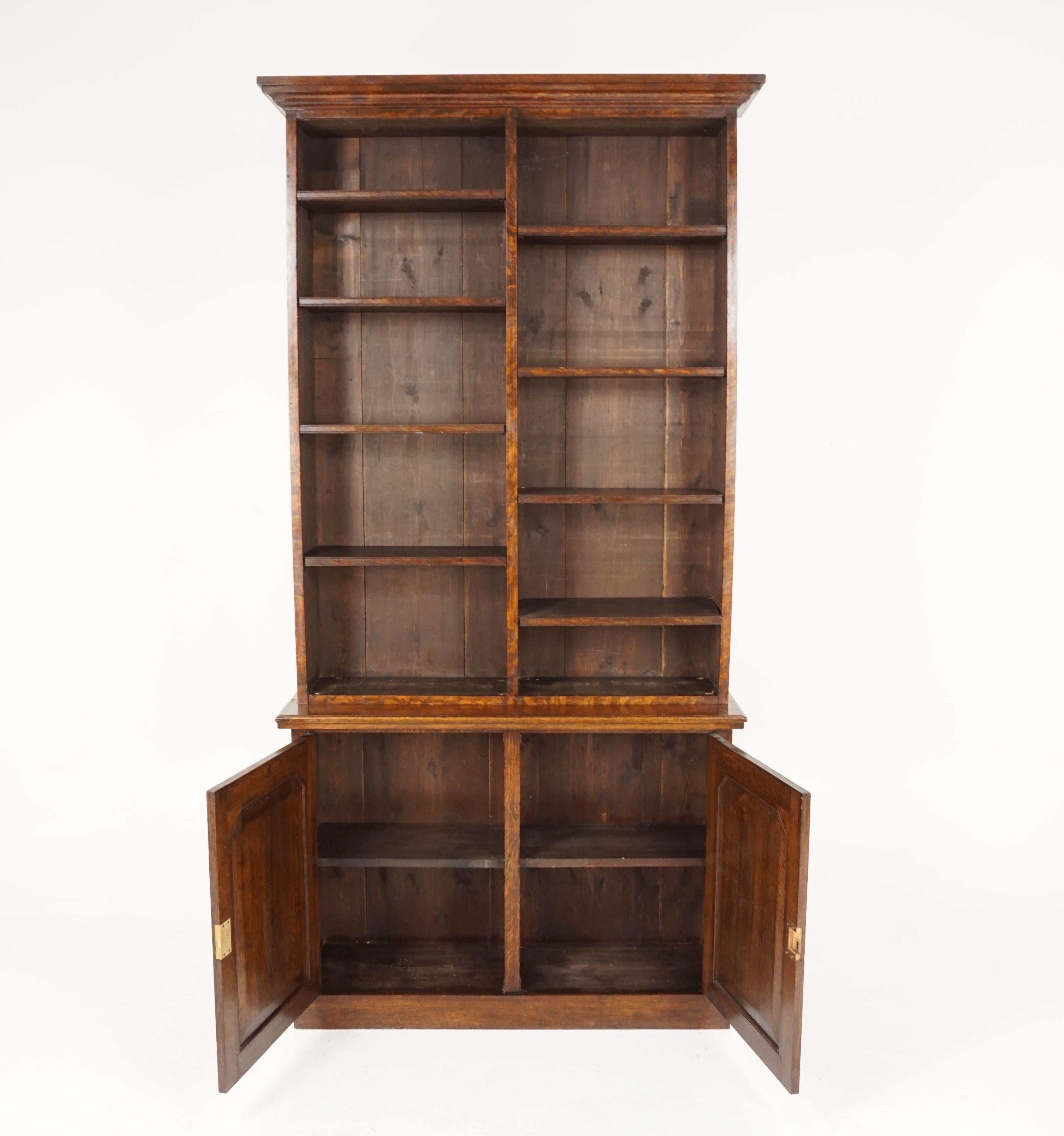 Antique Victorian tiger oak open bookcase display cabinet, Scotland 1890, B2340

Scotland, 1890
Solid oak
Original finish
Splayed moulded top cornice
Two part open bookcase with eight adjustable shelves
The base with a pair of paneled
