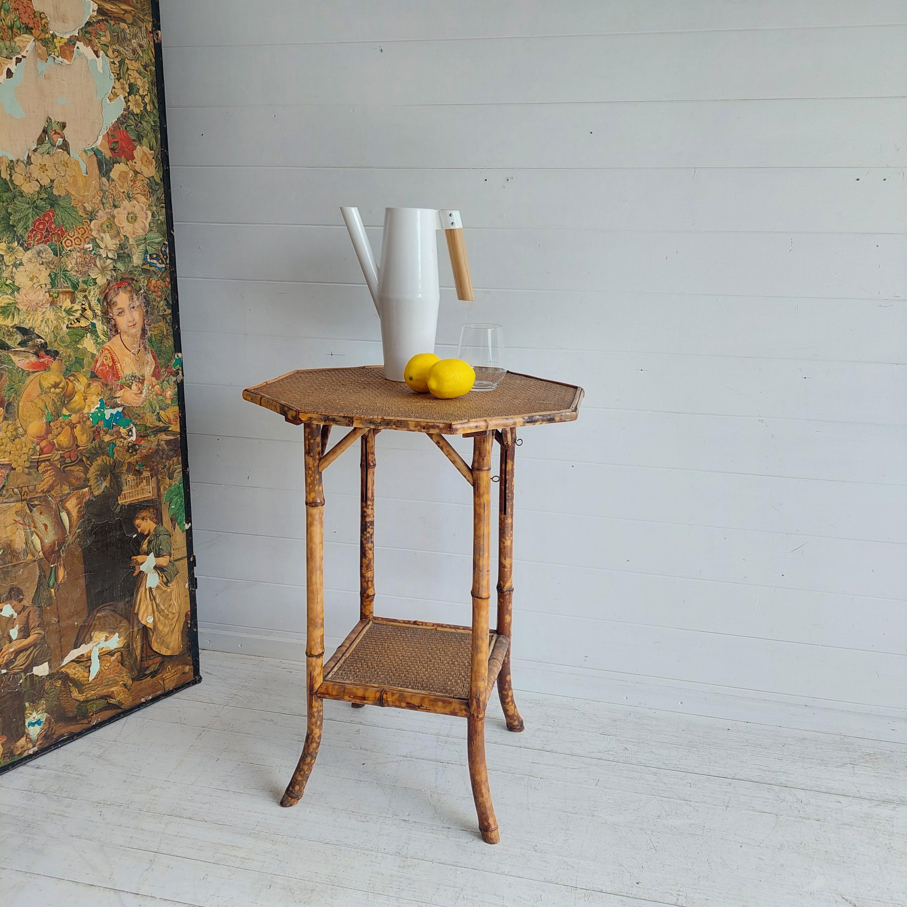 Wonderful example of a tiger bamboo side table.
Victorian era 1900s

This octagonal table has an attractive design.
An antique Victorian tiger bamboo table, made in the traditional design with a useful lower shelf and attractive diagonal strut