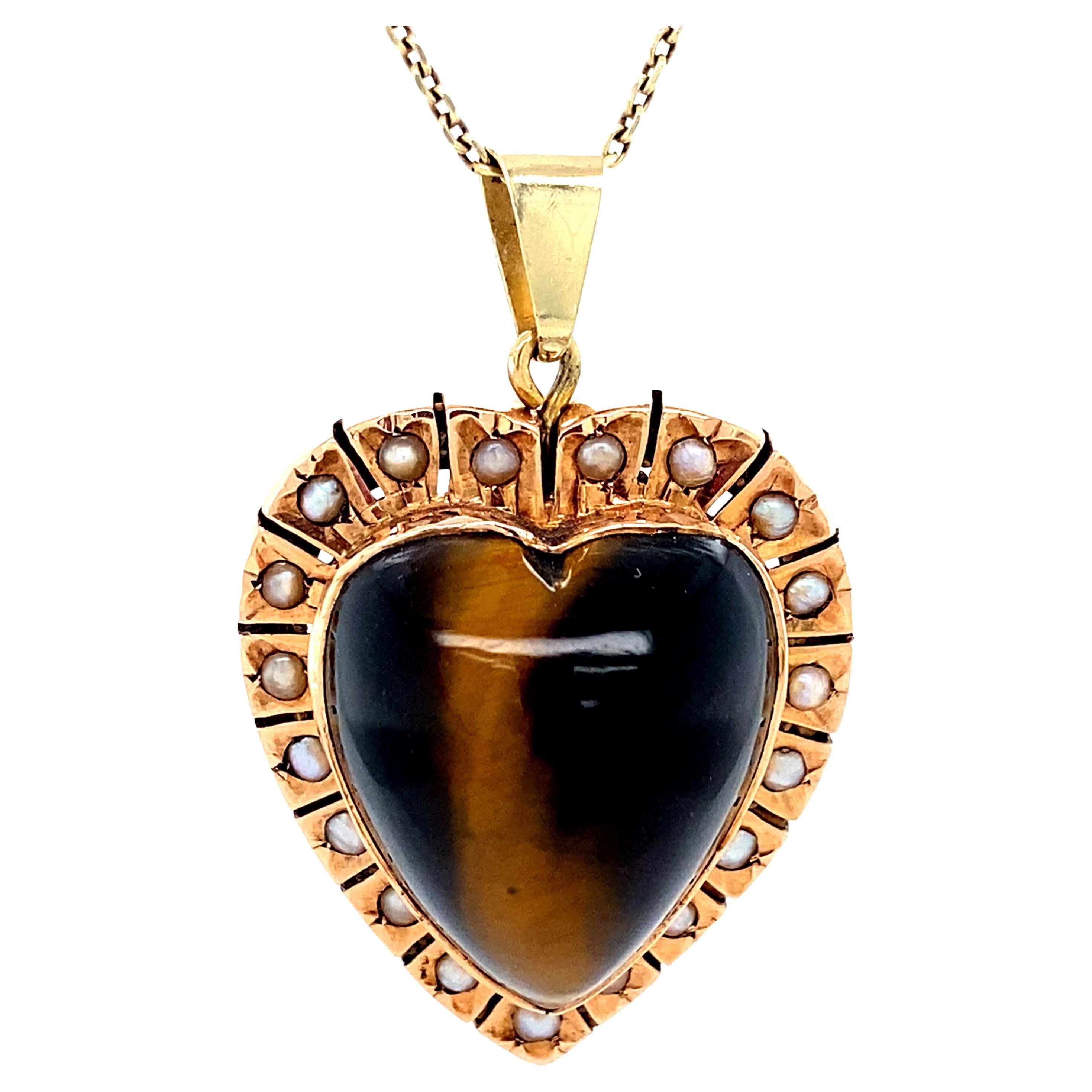 Antiguo colgante victoriano de corazón de ojo de tigre con halo de perlas semilla, 14 quilates