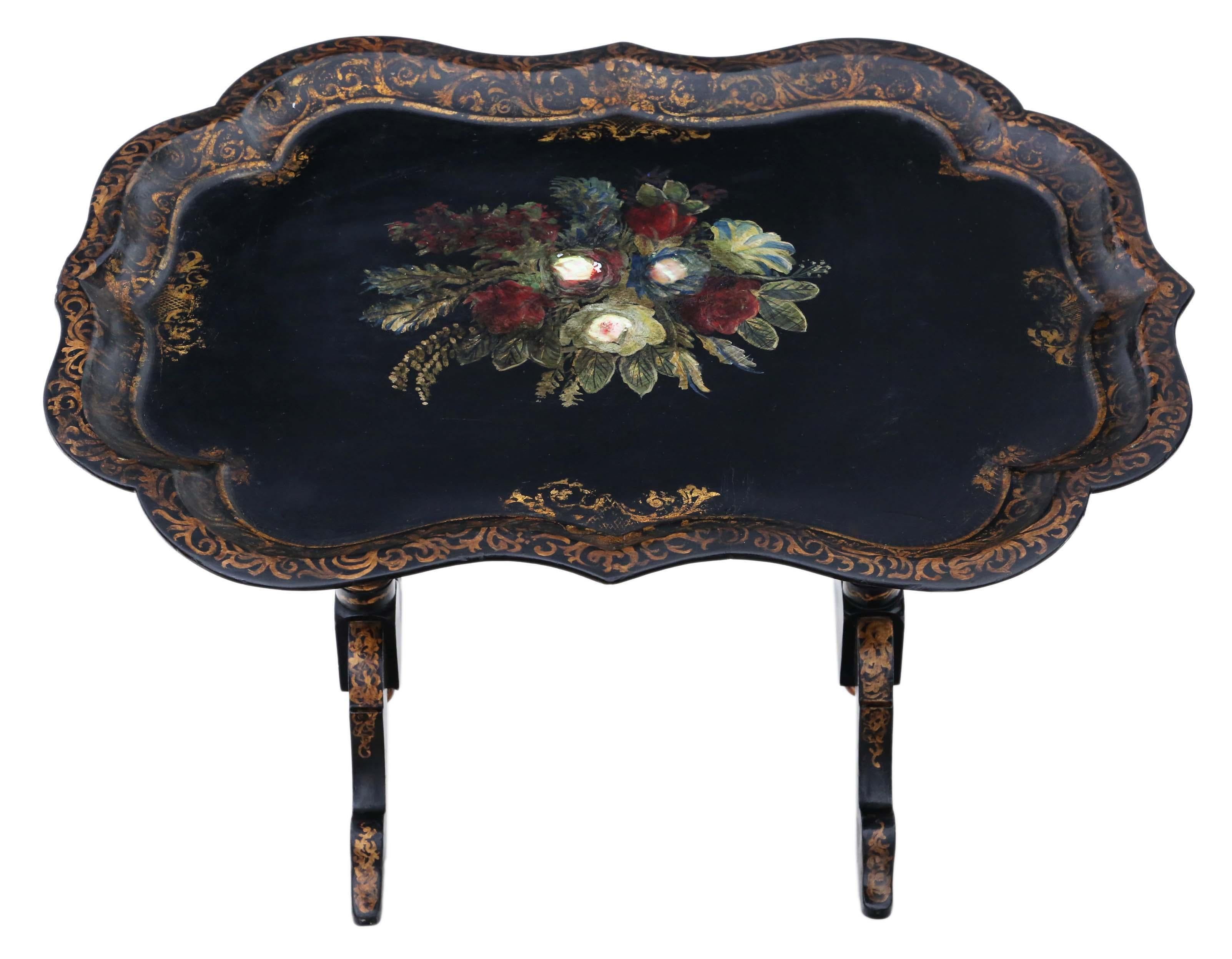 Antique quality Victorian tilt-top decorated black lacquer tray top table. Dates from circa 1880.
 
Would make a great coffee table. No loose joints.
Very attractive, with lovely proportions and styling. No woodworm.

Lovely age color and