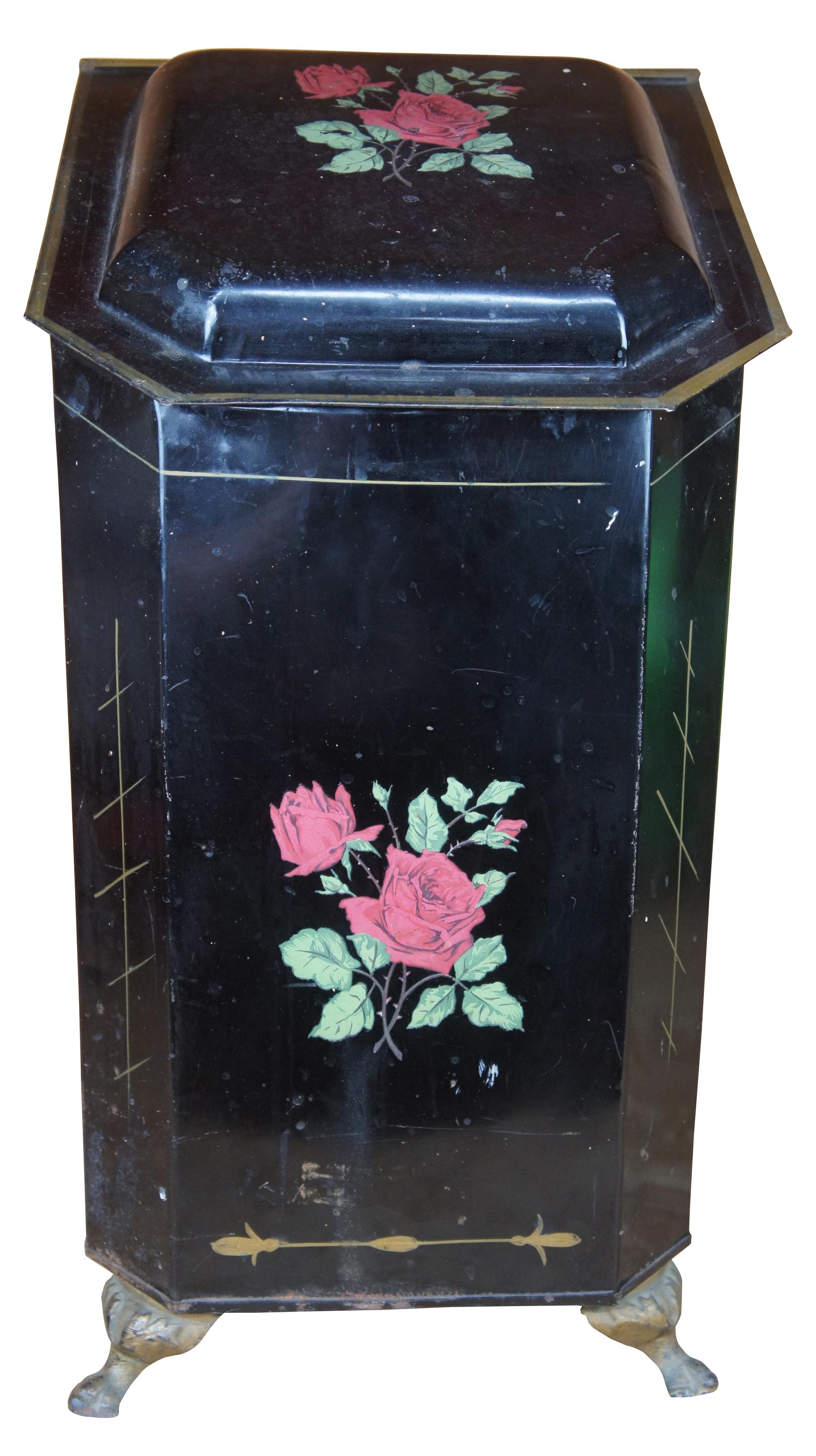 Antique coal bin or scuttle, made of metal/tin with hinged lid, tole roses, brass handles and footed base. 4450.
 