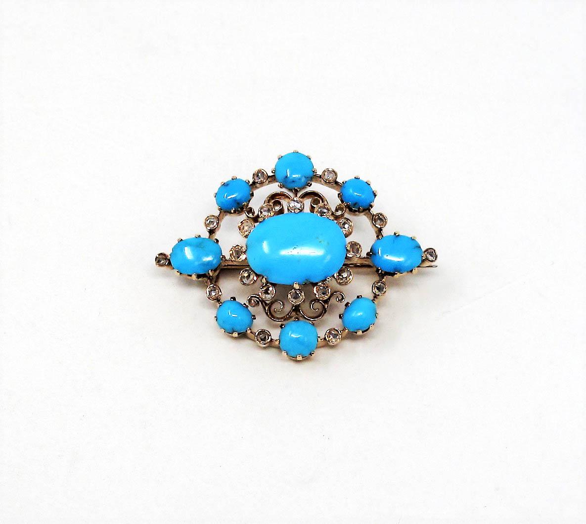 This incredible Victorian style turquoise and diamond brooch is an absolutely stunning piece of history. Set in a horizontal layout, the brooch pops with vibrant turquoise stones and sparkles with glittering diamond accents. Pair on a scarf,