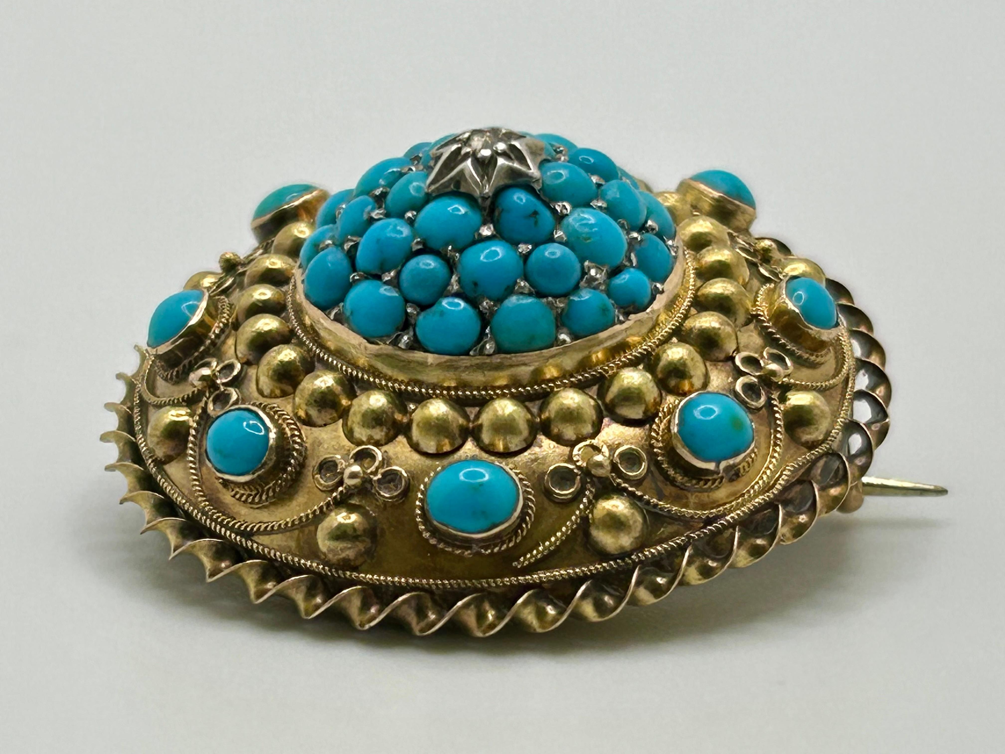 AN ANTIQUE TURQUOISE AND DIAMOND 18k BROOCH brooch. The domed body is set to the centre with a rose cut diamond on a ground of pave set cabochon turquoise, accented by further cabochon turquoise and intricately beaded and twisted gold, with a glass