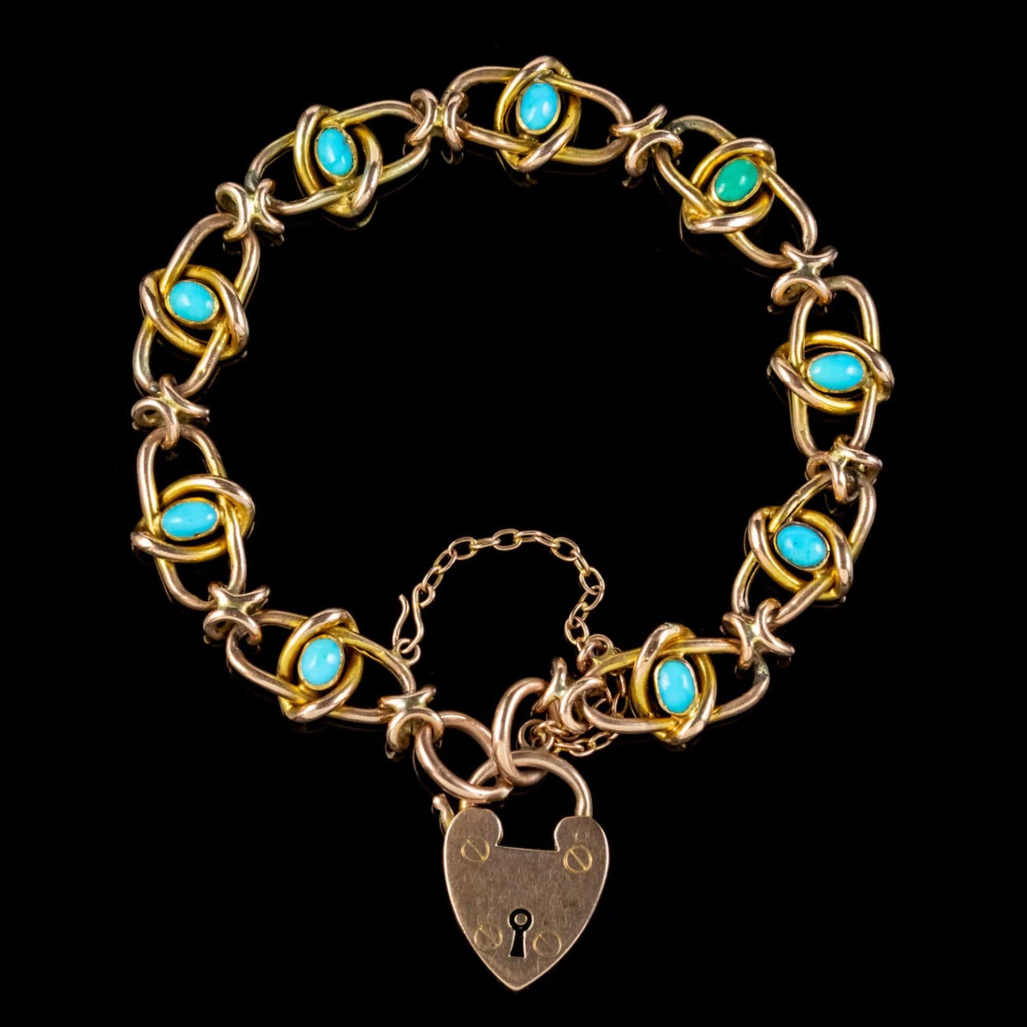 An exquisite antique Victorian bracelet from the late 19th century comprising of open-worked knot links crafted in 9ct gold and bezel set with a turquoise in the centre of each.

The turquoise have a calming blue/ green colour and have long been