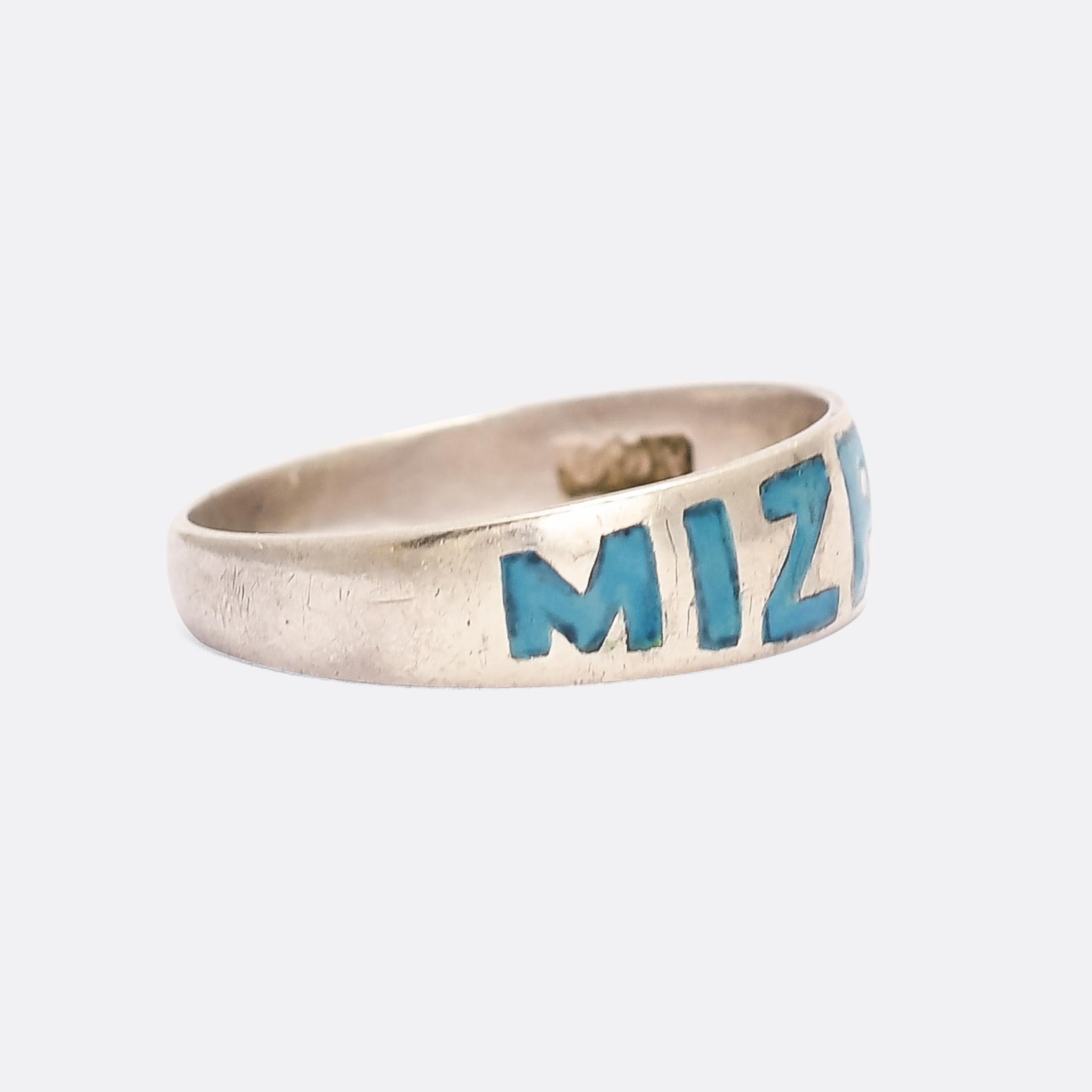 An unusual and quite charming antique MIZPAH ring dating from the late Victorian era, circa 1890. The lettering is big and bold, covering the whole width of the band, and finished in bright turquoise enamel. It's crafted in sterling silver, with