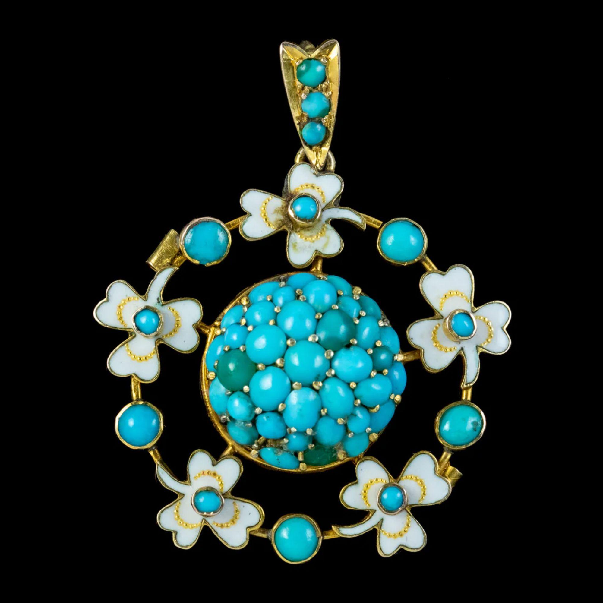 A pretty antique Victorian pendant from the late 19th Century fashioned in 9ct gold with a domed centre encrusted with blue turquoise and a wreath of white enamel shamrocks and further turquoise circling it. 

Turquoise is considered a lucky stone