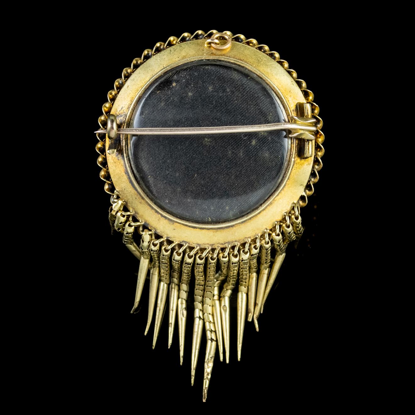 A highly unique Victorian Etruscan revival brooch decorated with beautiful Turquoise stones and crowned with a wonderful dome in the centre with a star set Diamond on top.

Etruscan revival pieces were crafted in the mid 1800s when ancient Etruscan