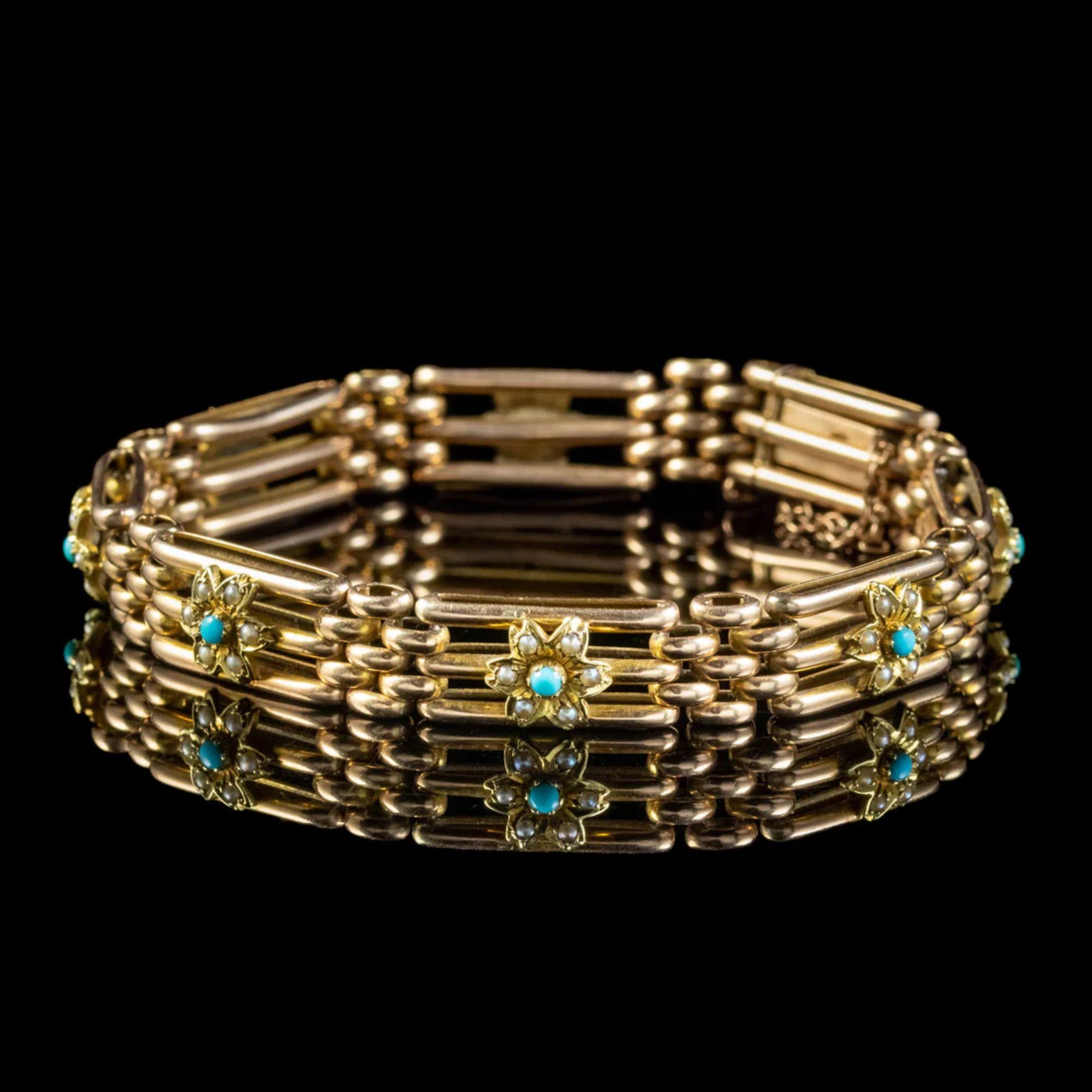 A grand antique Victorian bracelet from the late 19th Century made up of fabulous 15ct gold gate links topped with beautiful turquoise and pearl studded flowers in the centre of each. 

The links articulate beautifully together and have a good