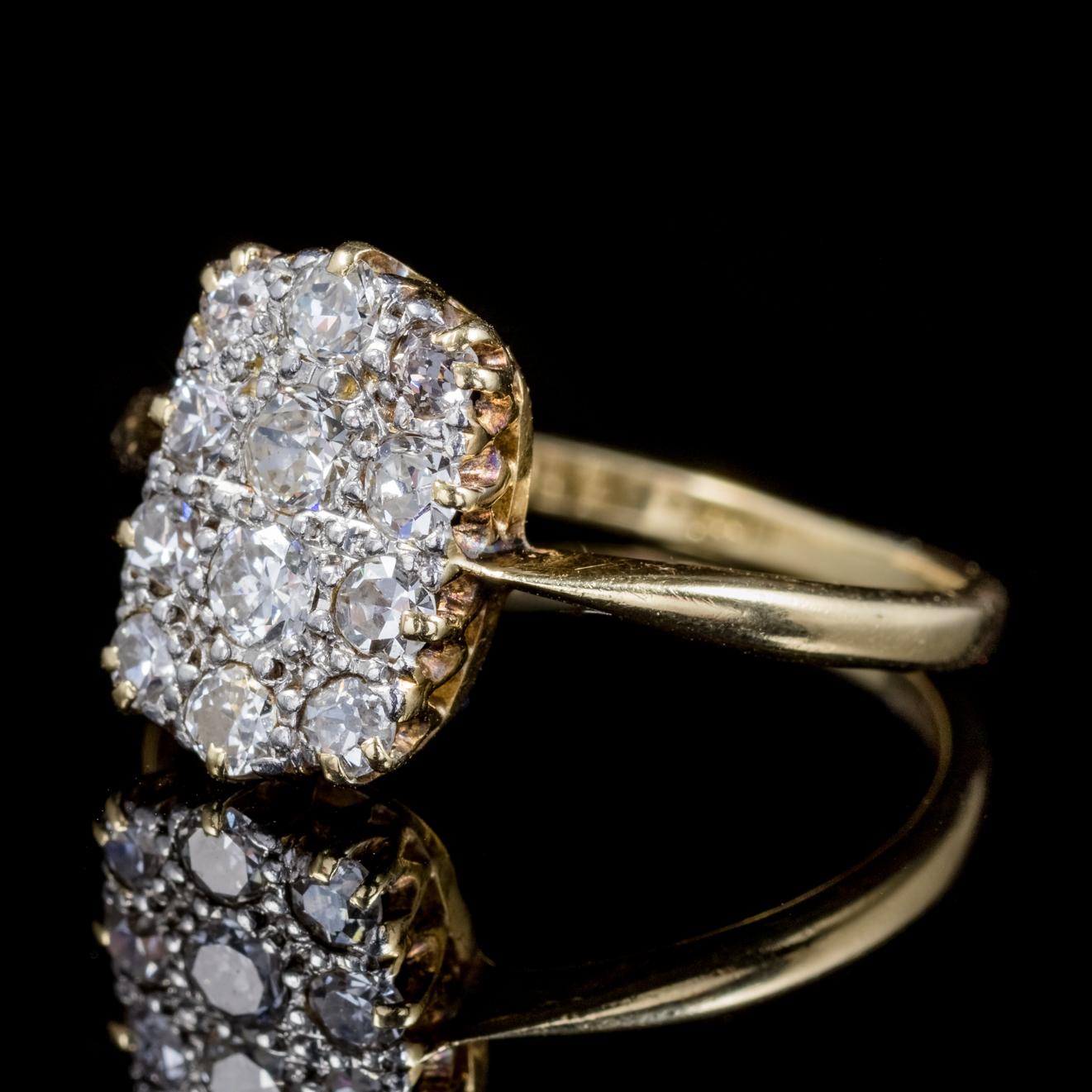 A spectacular antique 18ct Gold Diamond cluster ring from the Victorian era, Circa 1900. 

The ring is adorned with twelve glistening Diamonds, approx. 0.84ct in total across the face. 

Diamonds sparkle continuously and beautifully captivating the
