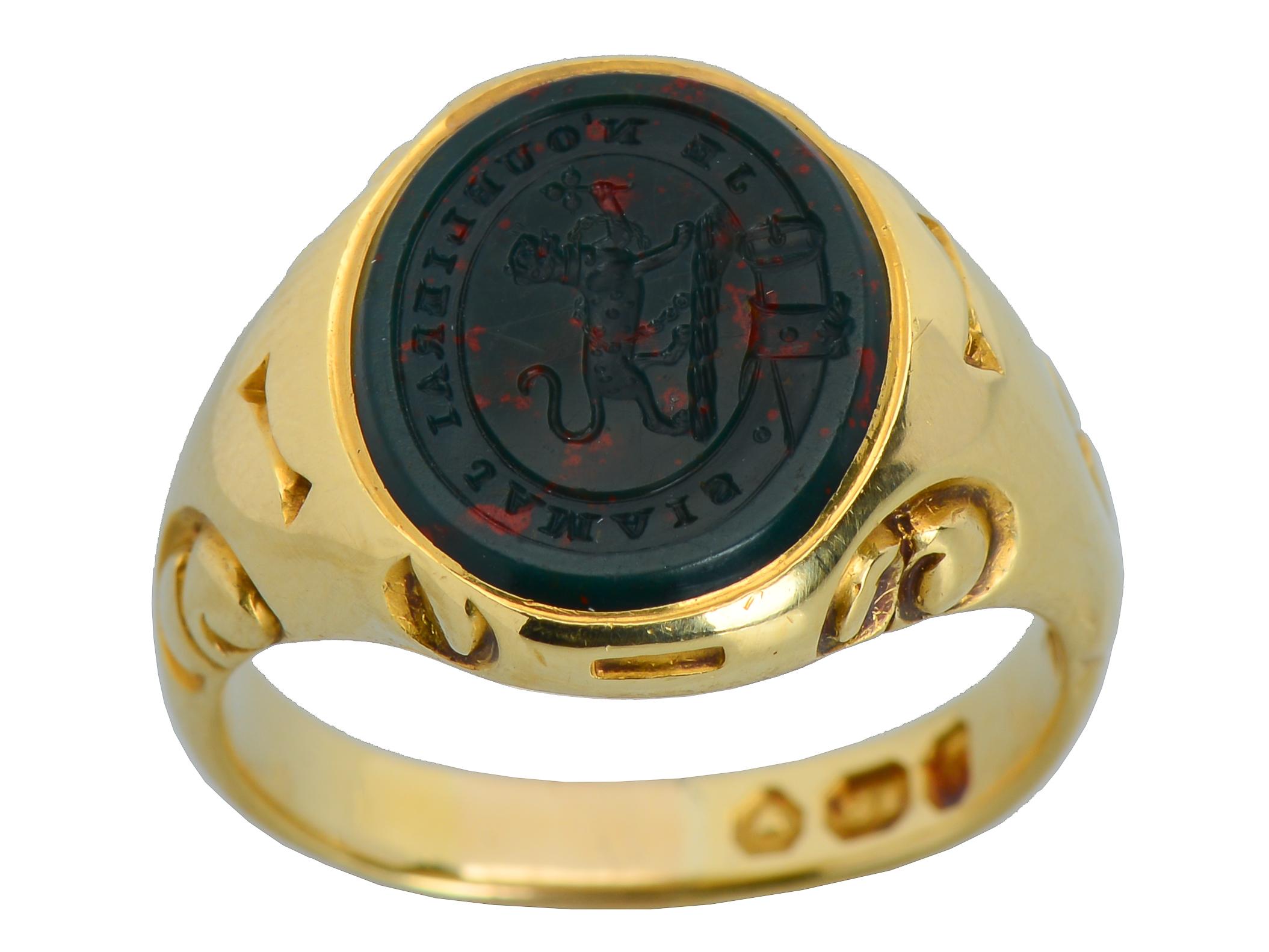 A singular Victorian signet ring in 18Kt gold,, well hallmarked and belong from a long line of English Baronets of the Hervey Bathurst family. I show a photo of the family castle and recent descendants below in photographs.  The ring is made of one